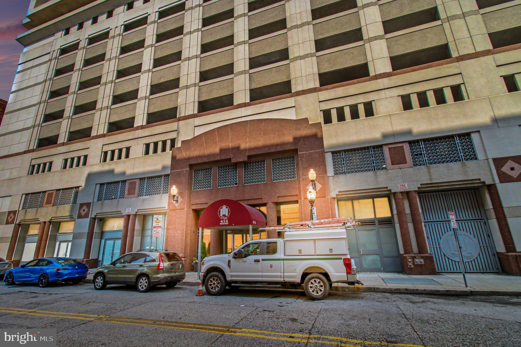 **Location, convenience, and city living come together at 414 Water Street!** Located in the heart of Baltimore’s vibrant Inner Harbor, this spacious two-bedroom, one-bath condominium puts you just steps from Power Plant Live!, the National Aquarium, museums, Port Discovery, shopping, dining, entertainment, and so much more. With easy access to both the Johns Hopkins and University of Maryland medical campuses, this is an ideal location for professionals, city enthusiasts, or anyone looking to enjoy all that downtown Baltimore has to offer.Inside, the home features **two generously sized bedrooms, a full bathroom, a spacious living room, and an updated kitchen**. The open living space is complemented by **beautiful views of Federal Hill and Baltimore’s iconic stadiums**, creating an impressive backdrop whether you're relaxing at home or entertaining guests. An in-unit washer and dryer add everyday convenience.One of the standout features of this residence is the **private storage room located on the same floor**. This is a particularly desirable amenity, as **only four units on the floor have their own storage room**. The property also includes **parking in the adjacent parking garage**, providing an added level of convenience that is especially valuable for downtown living.Residents of 414 Water Street also enjoy a variety of building amenities, including an **outdoor swimming pool, lounge and meeting area, and business center**.**Enjoy the best of Baltimore city living with the space, storage, parking, views, and amenities you've been looking for—all in the heart of the Inner Harbor!**