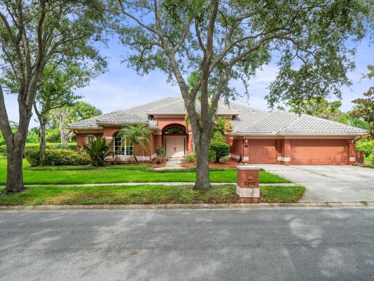 One or more photo(s) has been virtually staged. Welcome to the Exclusive Bayou Club!
Nestled in one of St. Petersburg's premier gated communities, this spacious 5-bedroom, 3.5-bath home offers an inviting open floor plan, soaring vaulted ceilings, and abundant natural light throughout.
Designed for both comfort and entertaining, the home features a bonus room (ideal for an office or den or 5th bedroom), a soundproof media room, and a generous living area with a cozy gas fireplace. The chef's kitchen is equipped with a gas cooktop (2018), double ovens (2018), refrigerator (2018), and a gas dryer hookup option, along with plenty of counter space for gatherings.
Retreat to the expansive primary suite with its spa-like bath, with bidet in the water closet, complete with a soaking tub and oversized his-and-hers walk-in closets. The split floor plan ensures privacy for family or guests.
Step outside to your private backyard oasis, where a pool and spa with birdcage enclosure create the perfect setting for year-round enjoyment. There is a gas grill bib hook up outside the screened enclosure of the pool.  The extra-large fenced yard is beautifully landscaped and maintained with an irrigation well pump (2000).
Additional upgrades include two new 4-ton HVAC units (2024), a Generac whole-home gas generator (2018), gas water heater, and a spacious 3-car garage.  All utilities are underground.  Hurricane shutters for all doors and windows.  
Located just minutes from downtown St. Pete, award-winning Gulf beaches, and major highways, this home blends privacy, convenience, and resort-style living. The Bayou Club community offers 24/7 guarded security consisting of two guards on duty at all times, one at gate, one patrolling the picturesque grounds, and optional Country Club membership with golf, tennis, fitness, and dining.  Also, the Bardmoor Country Club is within minutes.  Sam's Club, Publix and Lowes down the street.
This meticulously maintained, one-owner home is a rare opportunity in a sought-after neighborhood.  Schedule your private showing today!