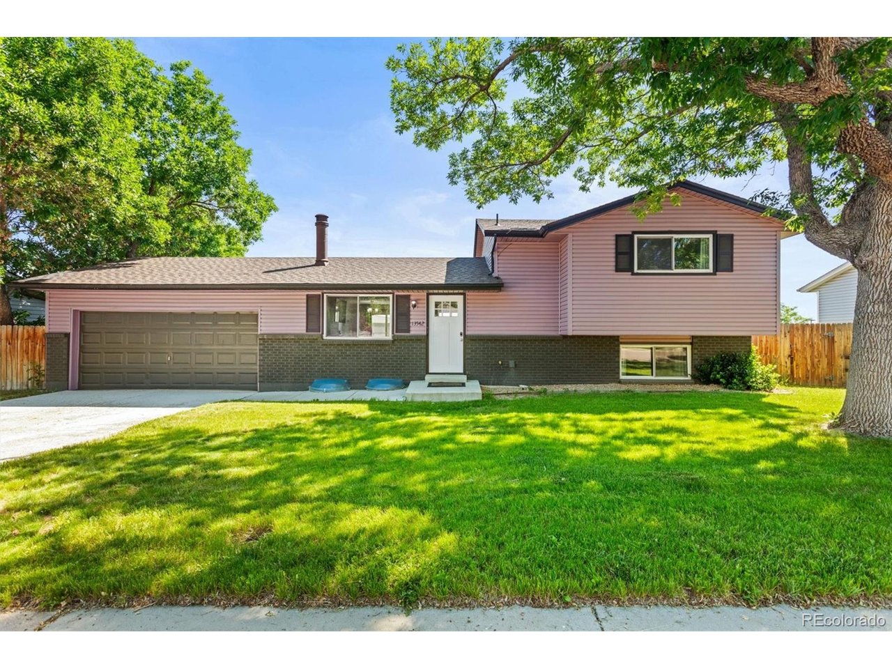 Completely remodeled in 2021, this move-in ready home in coveted Acres Green delivers the space, updates, and location today's buyers are searching for. Voluntary HOA with a neighborhood that shows real pride of ownership.The main floor features LVP flooring and a wood-burning fireplace with tile surround. The kitchen checks every box, with white shaker cabinets, quartz counters, tile backsplash, and stainless appliances and fixtures. Upstairs, 3 bedrooms, an updated bathroom, and new carpet. The lower level adds a 4th bedroom, updated bath, and flexible laundry - use this level or the basement, your choice. The unfinished basement is a blank canvas ready for your vision. The large backyard is fully fenced. Additional updates include newer windows, new roof, new interior paint, and a new sewer line. This list of updates gives buyers and their lenders confidence. The location is the bonus you didn't expect. Walk to Lonesome Pine Park and the newly updated facilities and tennis courts. Enjoy community events at Sweetwater Park and the full amenity network of South Suburban Parks and Recreation, including miles of trails. Park Meadows Mall, Costco, Sam's Club, and some of the metro's best dining are all just minutes away. Commuters will love the quick access to DTC, Meridian Business Park, and Inverness, with the Lincoln/I-25 light rail station just a mile away.Homes this updated, this well-located, and this well-priced are hard to find. Voluntary HOA is $40/year. https://acresgreen.org/ Come see 13542 Achilles Drive today!