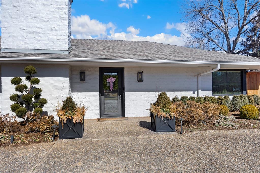 Welcome to 1803 Drakestone Avenue. This stunning one level ranch has been entirely remodeled with a contemporary design and a backyard built for entertaining. The home has 4 bedrooms, 3 full bathrooms and a powder bathroom, home office, functional mudroom/laundry room, the list can go ON!From the moment you enter this open concept home, you will be blown away by its high-end designer finishes and indoor/outdoor entertaining spaces.The living room and kitchen are filled with tons of natural light, courtesy of a large picture window looking out at the backyard oasis. The view makes it very enticing for guests to gather and watch the big game. The back patio has a large outdoor kitchen, complete with pizza oven, grill and beverage fridge so you can cook outside while kids play putt-putt or swim in the newly built heated pool/hot tub.  Back inside, family and friends can gather around the living room fireplace or large kitchen island. The Kitchen's contemporary design includes tons of hidden storage, paneled appliances, a built-in coffee maker, wine fridge, 48" gas range with double ovens, marble slab backsplash, pot filler and a show stopping antique mirror range hood. Just off the kitchen is a great home office. On the other side of the kitchen is a great den and a powder bath. Primary bedroom is on one side of the home with a beautiful fireplace. Primary bathroom is well equipped with heated floors, venetian plaster walls, his and her closet, bath tub and shower. Three bedrooms on the opposite side of the house are spacious and private. This home is a show stopper and you will not want to miss it! Make your appointment!