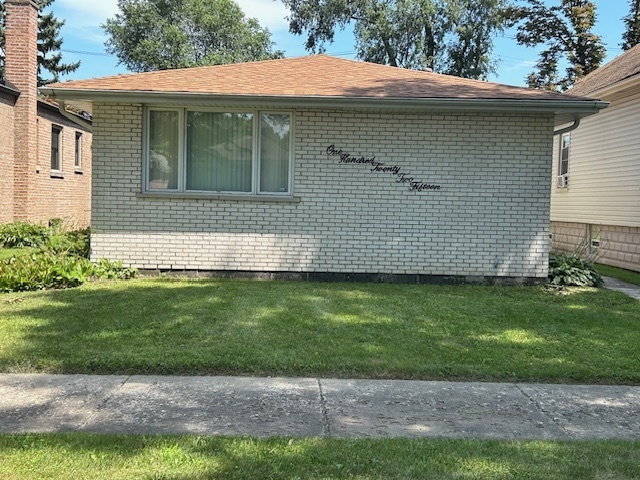 Charming Split-Level Brick Home on a Serene Tree-Lined Street  Welcome to this lovely 3-bedroom, 2-bath split-level home nestled on a quiet, picturesque street. This well-maintained brick beauty offers a spacious open floor plan, ideal for both everyday living and entertaining guests. The large kitchen, updated in 2018, features warm oak cabinets and plenty of counter space. Downstairs, you'll find a comfortable family room, a full bath, and a convenient utility room-perfect for extra living space or a home office setup. Enjoy the outdoors in your generous backyard, great for relaxing, gardening, or play. The property also includes a 2-car garage and a brand-new roof installed in 2022. Don't miss your chance to own this inviting home in a peaceful neighborhood-schedule your tour today!