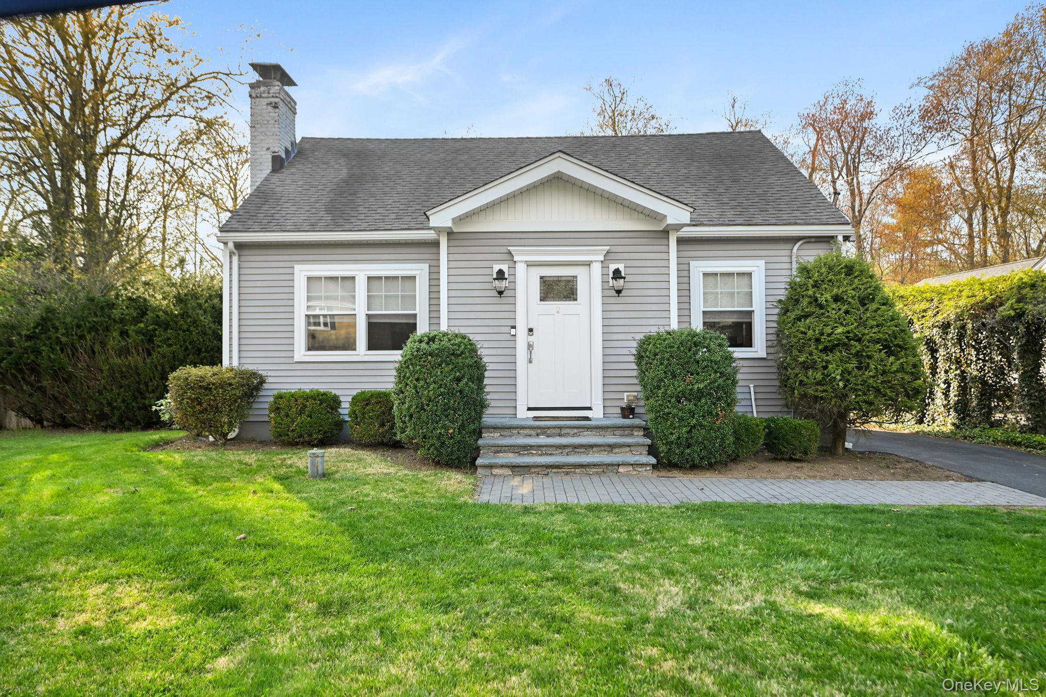 Welcome to 15 Maryland Avenue, a beautifully renovated home offering the perfect blend of modern comfort and timeless style, ideally located in the heart of Armonk within the highly regarded Byram Hills School District.Set back from the road, this charming 3-bedroom residence offers a sense of privacy with a fully usable, level backyard and a detached two-car garage. Thoughtfully redesigned in 2019, the home features today’s most desirable amenities, including a top-of-the-line GE appliance package, hardwood flooring throughout, and a functional layout designed for everyday living and effortless entertaining.A welcoming entry foyer with a custom built-in bench and coat closet sets the tone for both style and convenience. The living room, anchored by a stone wood-burning fireplace, is warm and inviting, enhanced by large windows and recessed lighting that fill the space with natural light.The sun-filled formal dining room is elegantly framed with detailed molding and classic wainscoting, and flows seamlessly into the gourmet kitchen, perfect for hosting gatherings. The kitchen is truly the heart of the home, featuring custom wood cabinetry, stone countertops, an oversized stainless steel sink beneath a window, a storage closet, and a beautifully designed peninsula that provides the ideal setting for casual dining, morning coffee, or a full meal.Just off the kitchen, a stylish powder room adorned with wainscoting and an additional closet offer convenience and thoughtful design.One of the home’s most sought-after features is the main-level owner’s suite, offering comfort and ease. This serene retreat features hardwood flooring, two large windows, and a private hallway leading to a well-appointed bathroom with a glass-enclosed shower, built-in bench, large vanity, and elegant finishes.Upstairs, an elegant staircase leads to two additional bedrooms and a full bathroom, providing flexible space for guests, or a home office.The outdoor space is equally appealing, with a stone patio designed for easy entertaining and seamless indoor-outdoor flow, accessed directly from the kitchen. The private backyard offers plenty of room to relax, play, or host gatherings.Located just minutes from downtown Armonk Square, you’ll enjoy convenient access to local shops, restaurants, and a supermarket, along with close proximity to major roadways and Westchester County Airport.A wonderful opportunity to enjoy turnkey living in one of Westchester’s most sought-after communities.