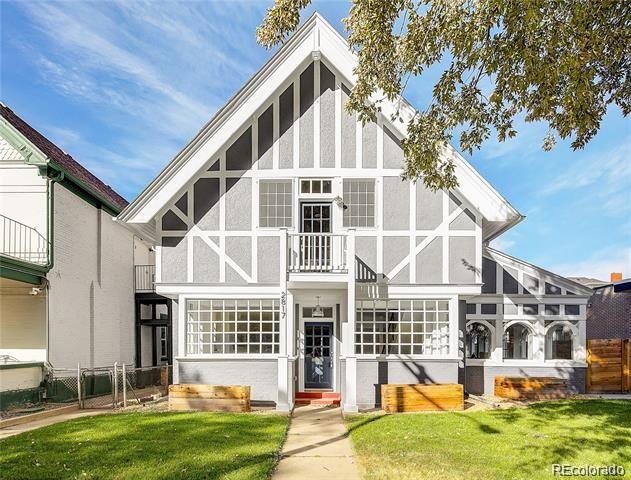 Rare Investment Opportunity & Luxury Living in High-Demand LoHi / Highlands! Welcome to 2817 W 33rd Ave, a stunning, down-to-the-studs remodeled Denver masterpiece offering unparalleled versatility and incredible rental income potential. Spanning 4,000 square feet, this one-of-a-kind property seamlessly blends historic charm with high-end modern design. Experience a flawless open floor plan boasting soaring high ceilings, expansive windows, original vaulted ceilings, exposed beams, rich hardwood floors, and a spectacular chef’s kitchen paired with a custom wet bar. The oversized primary suite is a true retreat, complete with a luxurious en suite bathroom, a spacious walk-in closet, and a sunroom wrapped in 10 windows. Outside, enjoy a fully fenced yard with a lush lawn, majestic old-growth trees, a 2-car garage, and an additional alley parking space. Optimized to maximize cash flow or serve as the ultimate house-hack, the second floor features a complete lock-off layout with 2 bedrooms, a second living room, a full kitchen, private laundry, and a separate rear entrance—currently rented for $3,325/month plus utilities. The main/lower level was previously rented for $2,995/month. Live in one level and let the other pay your mortgage, rent both to secure a powerhouse addition to your investment portfolio, or effortlessly convert it back into a massive, single-family dream home. Don't miss your chance to own a truly special piece of Denver history and fine design in one of the city's most walkable, vibrant neighborhoods!