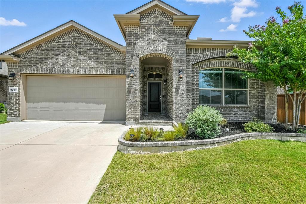 SELLERS ARE OFFERING A 2-1 BUYDOWN WITH AN ACCEPTABLE OFFER, WHICH COULD SAVE YOU AROUND $8600 IN PAYMENTS OVER THE FIRST TWO YEARS! PLUS, WASHER, DRYER, AND REFRIGERATOR ARE INCLUDED! Welcome to this charming and beautifully landscaped home in Copper Creek. Meticulously maintained, this home features an inviting living area with a cozy gas fireplace and beautiful wood floors. The stunning kitchen is a chef’s dream, complete with a gas range, a walk-in pantry, a built-in coffee bar, and an open layout that flows seamlessly into the dining and living spaces. A dedicated office provides flexibility and can easily be converted into a fourth bedroom, den, or flex space. You’ll also find a cute bonus nook—perfect for homework, remote work, or a creative corner. The home includes a convenient mudroom to help keep everything organized as you come and go. The spacious primary suite is a relaxing retreat with wood floors, an en suite bath featuring a separate shower, garden tub, and a generous walk-in closet. The backyard offers a covered patio—ideal for entertaining—with plenty of room for pets or play. A grassy greenbelt area in the front yard adds a touch of extra outdoor space. This scenic community offers parks, trails, a pool, splash pad, and a peaceful catch-and-release pond. You’ll also enjoy the convenience of an on-site elementary school and a location just minutes from shopping, dining, and more!