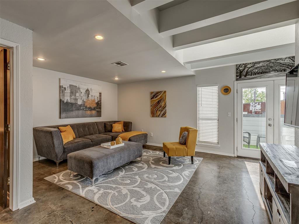 Located in the desirable SoSA District, this stunning 3-story Classen Glen condo offers modern urban living just steps from Midtown and Downtown OKC. Featuring 3 bedrooms, 3 full bathrooms, and a spacious loft, this home provides a flexible layout perfect for entertaining or quiet city living. The first floor boasts an open-concept kitchen, living, and dining space with concrete floors, recessed lighting, stainless steel appliances, and quartz countertops. Enjoy city views from the private balcony just off the living room. The second floor includes two bedrooms, two full bathrooms, a laundry area, and a second private balcony with more skyline views. On the third floor, you’ll find a bright loft and third bedroom with access to a third balcony. Each level offers outdoor space with expansive views of downtown OKC. High ceilings, custom wood stairs, and modern finishes throughout. Amenities include two secure underground parking spaces in a shared garage, a gated community pool, and a pool house. Enjoy walkability to restaurants, bars, museums, parks, and entertainment. This condo is spacious, secure, and ideally situated in one of OKC’s most sought-after neighborhoods. A rare find offering both style and convenience!