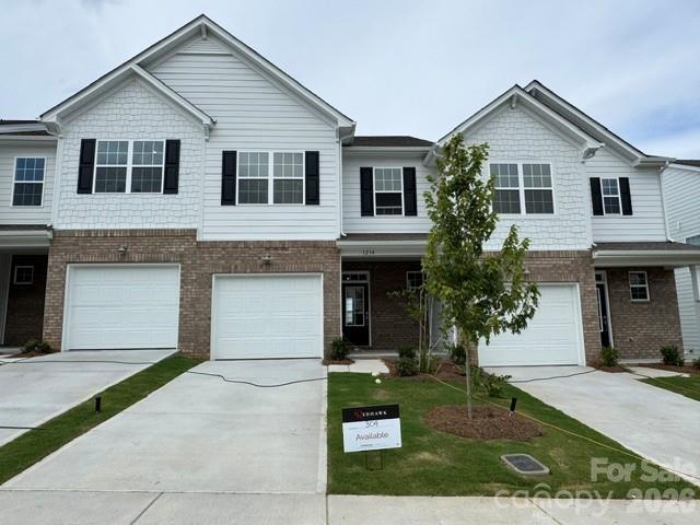 Welcome to our popular Abbey model! This 2-story townhome includes 3 bedrooms and 2.5 baths. The large covered front porch welcomes you upon arrival. Step right in and find an open kitchen to family room and dining area - plus a screened in back porch! The owner’s suite is upstairs along with two other secondary bedrooms and the laundry room. Plus, our signature "Everything's Included" means you will have quartz kitchen countertops, 4 x 16 tile backsplash, owners shower tile walls, and luxury vinyl plank flooring throughout the main level and on the stairs. Redhawk is a true lifestyle community with planned amenities that will feel like a resort! These include a 2-story clubhouse, walking trails, two swimming pools, two-acre park, playground, tennis and pickleball courts, sand volleyball, dog park, disc golf and much more! Redhawk in Belmont is also just 30 minutes from uptown Charlotte and 20 minutes to Charlotte Douglas airport. 15 min to National Whitewater Center!