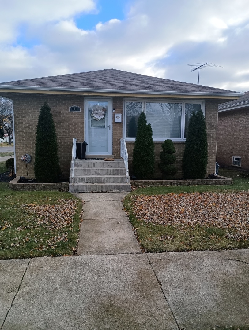 Nice corner 3 bedroom brick ranch -Custom mirrored walls in Liv rm and eat-in kit/din area - Newer kitchen cabinets/corian counter tops/appliances  & ceramic tile floors and bath. Hardwood under carpet - Large full finished basement w separate laundry/storage area. Fenced in yard w/play area. NEW furnace. Not a short sale or foreclosure.