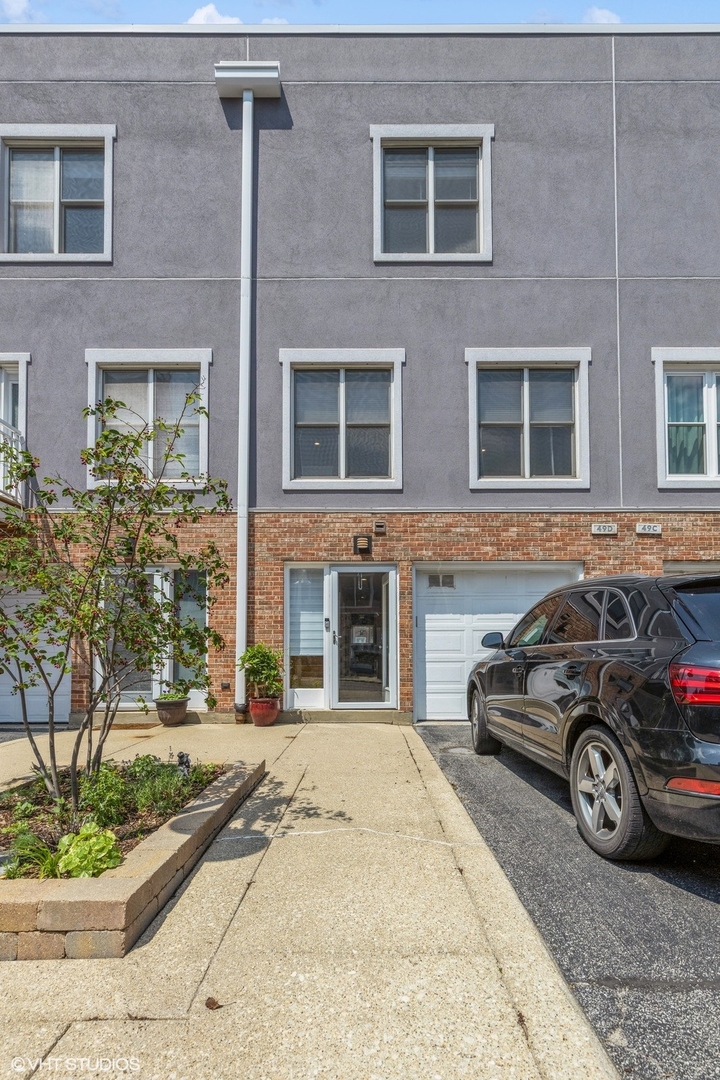Elegant & Family-Friendly 3-Bedroom, 3-Bath Townhome in the South Loop School District. Discover the perfect blend of comfort, style, and functionality in this beautifully maintained townhome, ideally located across from Cottontail Park in the heart of the South Loop. With spacious living across three thoughtfully designed levels.  Recent upgrades include a luxurious new primary bathroom, updated decks, and a refreshed facade-making it truly move-in ready.    Third Floor - Restful Retreats with a Luxurious Upgrade.  The top floor features two generously sized bedrooms with ample closet space, warm hardwood floors, and private en-suite bathrooms. The serene primary suite opens to a private balcony and now boasts a newly renovated spa-style bathroom complete with a soaking tub, separate glass-enclosed shower, new vanity, and a skylight that fills the space with natural light. The second bedroom features a bathtub with a walk-in closet.  Second Floor - Bright, Open Living & Entertaining Spaces. The main living level offers a warm and welcoming living room with a fireplace and west-facing balcony-perfect for cozy evenings or sunlit afternoons. The stylish kitchen features granite countertops, stainless steel appliances, and a breakfast bar that flows effortlessly into the spacious dining area, ideal for family get together and entertaining guests.  First Floor - Flexible Family Space. The entry level includes a versatile third bedroom currently used as an office and guest suite, complete with a queen-size Murphy bed. A full bathroom with a glass-enclosed shower, and a recreation area open to a fenced backyard, perfect for children to play or enjoying sunset views as a family.    Additional Highlights, one-car attached garage plus additional a parking space on a driveway. Access to a fitness center in the neighboring mid-rise building, pool access at Dearborn Park I, walkable to parks, top-rated schools, grocery stores (Mariano's, Trader Joe's), museums, dining, the lakefront, and public transportation nearby schools include South Loop Elementary, British International School, Old St. Mary's, and Daystar Academy with its unbeatable location, family-friendly layout, and elegant updates, this home is ready to welcome you. Come fall in love with your next chapter in this beautiful South Loop Townhome.