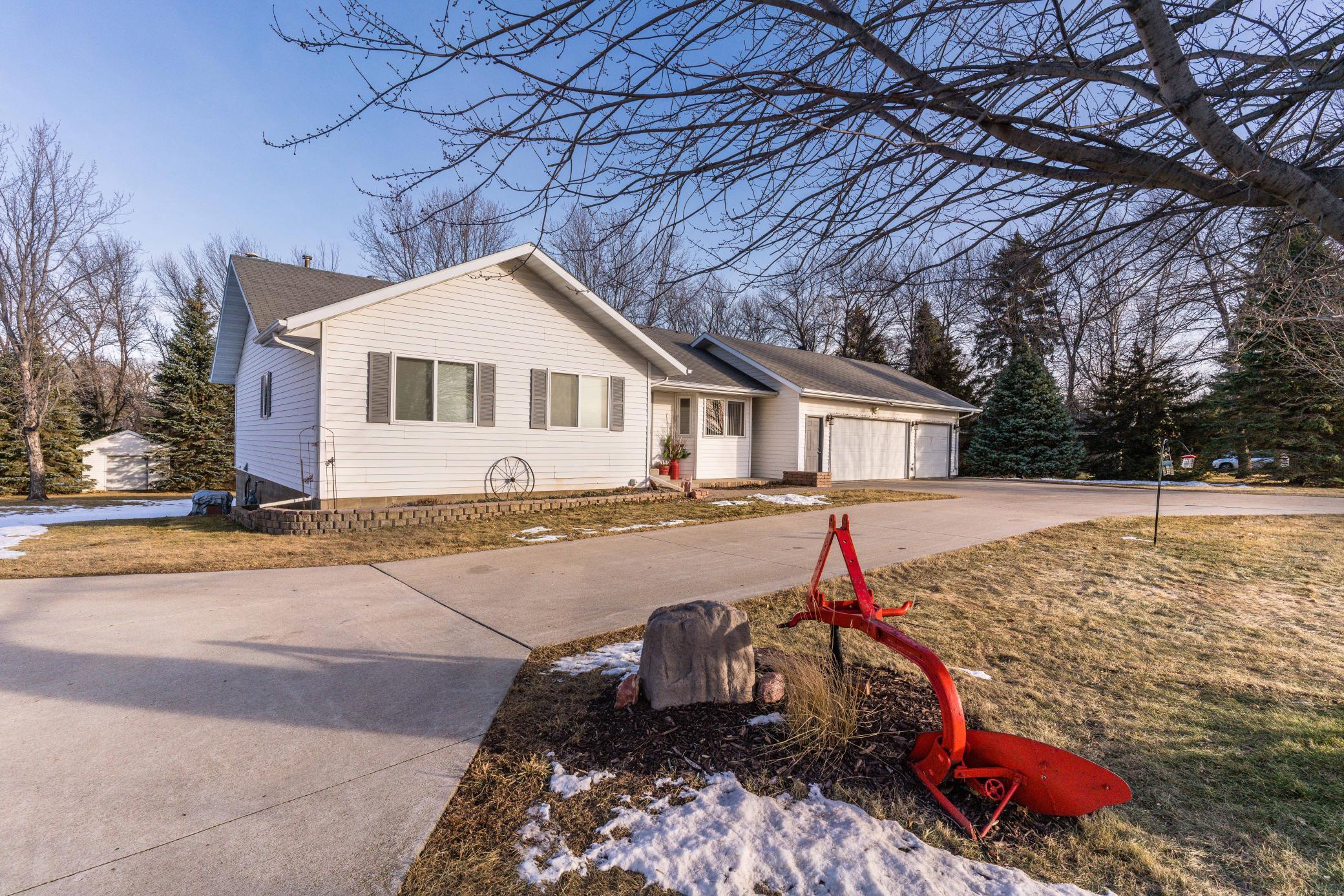 Rare 2 acre country property just on the edge of Fergus Falls!  Get the best of both worlds with the private, country feel but yet conveniently located close to all the City amenities.  This well-maintained 5 bedroom, 3 bath home has so much to offer including Miele appliances, 3 main floor bedrooms, one being a master suite with a beautiful tiled tub/shower, main floor full bathroom, in-floor coil heat in master bath and kitchen, and solid oak interior doors.  The lower level includes 2 bedrooms, a 3/4 bathroom, family room, and a large extra bonus room.  Updates include a remodeled main level bathroom, master bath vanity/sink/fixtures, kitchen countertop/sink/dishwasher, patio door, some new windows, furnace and central air, paver sidewalk, and septic system (see Improvements List).  The property also features a 3 stall attached, heated garage, 3 stall detached garage, vinyl siding, horse loafing shed, outdoor storage/garden shed, and many mature trees including various fruit trees.