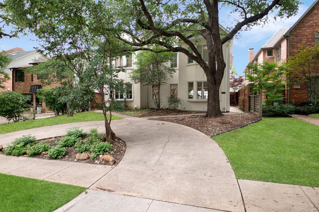 Discover sophisticated living in University Park, a highly sought-after Dallas neighborhood known for its tree-lined streets, timeless architecture, convenient access to premier shopping, dining, entertainment, and recreation. This spacious home features light-filled living spaces designed for comfort and entertaining. The updated eat-in kitchen includes granite countertops, double ovens, and a large island with dual work areas. The open living and dining area offers a gas log fireplace and french doors leading to a private outdoor patio with a vine-covered arbor and slate tile flooring. The primary suite features dual closets, and an ensuite bath with separate vanities, soaking tub, and glass-enclosed shower. Additional highlights include a rear-entry two-car garage, alley access, and circular front drive parking. Perfectly located near Southern Methodist University, the property offers convenient access to shopping, dining, and entertainment destinations including Snider Plaza and Highland Park Village. Nearby parks, green spaces, and access to the Katy Trail provide excellent opportunities for outdoor recreation. The central location also offers quick access to Downtown Dallas, Uptown, the Dallas Arts District, major employment centers, medical facilities, and Dallas Love Field Airport. This property is located within the attendance boundaries of Highland Park Independent School District. Buyers and tenants should independently verify school information and availability.