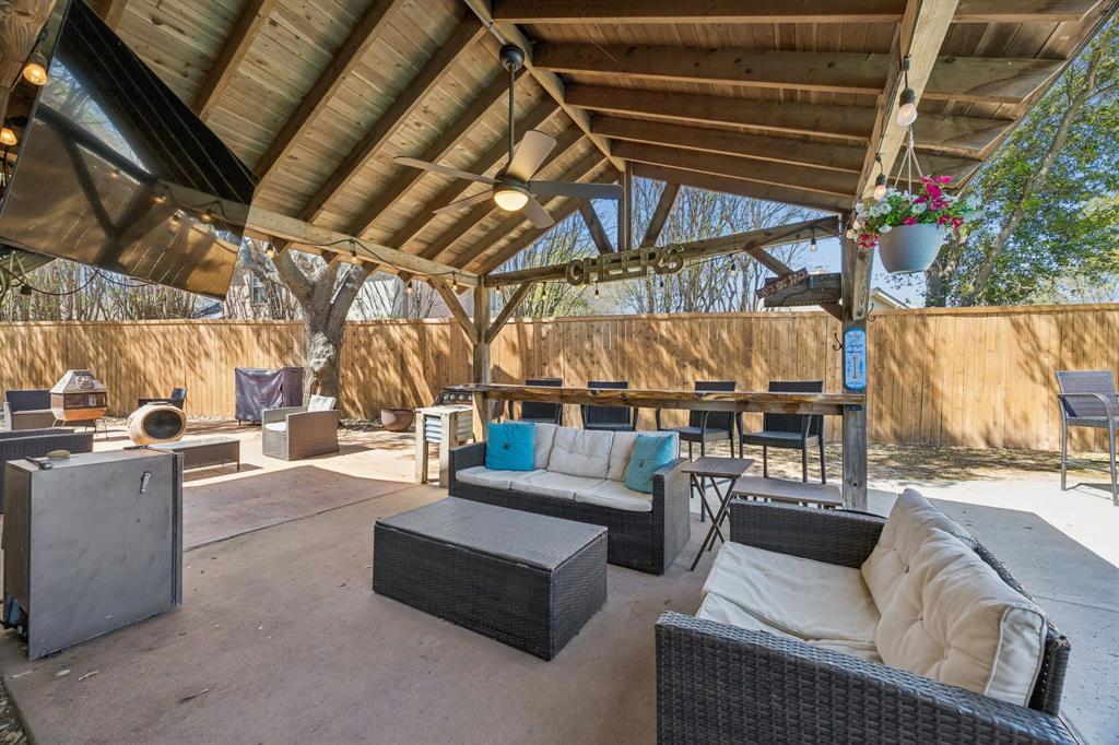 Your own private resort awaits! Dive into endless fun and relaxation with a sparkling pool featuring cascading waterfalls, a versatile sports court, and both covered and open patios perfect for entertaining or unwinding. With 4 bedrooms—3 upstairs and 1+ office downstairs—this home offers the ideal layout for convenience and comfort. Recent updates, including a new roof, microwave, oven, dishwasher, gorgeous wood flooring in most areas, a water heater, and serviced garage doors with a new spring, mean you can move in with peace of mind. Get ready to create lasting memories in this exceptional retreat!  5 Cimarron Court is located in the gateway to Trophy Club with easy access to Highway 114 taking you to Dallas or Fort Worth. A local shopping center provide the essentials and an array of dining and shopping options are very close. ***buyer will need new survey