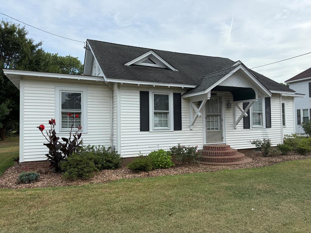 Charming 1940's bungalow has finished 2nd floor with 2 large rooms. Conveniently located in Cheriton close to Oyster boat ramps and Cape Charles beaches and marina. Oak floors thru out gives this sturdy home a bit of old world feel to it. Home is move in ready! Kitchen and baths were both recently remodeled. Large workshop in the back. Plenty of off street parking and room for additional outbuildings,