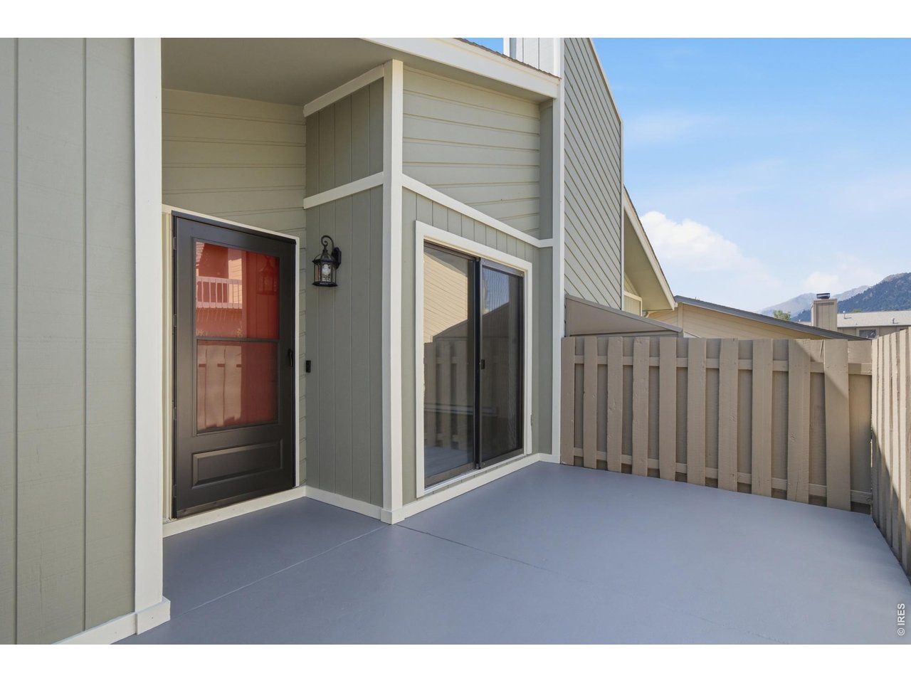 Here is the classic Estes Park wish list: Mountain views. A cozy fireplace. Walkable to Lake Estes. Easy access to downtown. A place to come back to after hiking, shopping, wildlife watching, or eating too much pizza across the street. This fully remodeled 2-bedroom, 1-bath end-unit condo actually checks the boxes without asking you to take on a remodel first. Set in a convenient Estes Park location near Lake Estes, the marina, Antonio's Pizza, downtown shops and restaurants, and a short drive to Rocky Mountain National Park, this is the kind of low-maintenance mountain escape that makes getting away feel easy. Use it as a weekend retreat, a full-time home, a first mountain purchase, or the future downsizing plan that lets you spend more time exploring and less time maintaining. Inside, the hard work is already done. The home has been fully remodeled with a new kitchen, new bathroom, new windows, updated flooring, colorful fresh paint, stainless steel appliances, and a stacked washer and dryer. The vaulted living room adds light and character, while the wood-burning fireplace gives you the classic mountain evening everyone imagines after a day outside. Both bedrooms are on the main level with no stairs, making the layout practical and comfortable. The kitchen opens nicely to the dining area, so coffee, dinner, and card games with the people you love can happen without everyone feeling tucked into separate corners. As an end unit, you get extra privacy, mountain views, and a fenced patio where quiet mornings and cool evenings feel exactly like they should in Estes Park. Views of Prospect Mountain, Twin Sisters, and Longs Peak add the daily reminder that you are not just buying square footage, you are buying a place in the mountains. If you have been waiting for an Estes Park condo with the views, location, quality, and low-maintenance lifestyle people always talk about, this is the one to see before someone else takes action first.