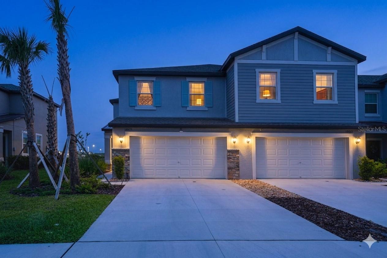 Welcome to this beautifully designed townhome located in the highly desirable Mirada community in San Antonio, Florida. Offering a perfect blend of comfort, style, and low-maintenance living, this residence features a modern open-concept layout that seamlessly connects the living room, dining area, and kitchen—creating an inviting space ideal for both everyday living and entertaining.  The kitchen is thoughtfully designed with contemporary finishes, ample cabinetry, and generous counter space, making it both functional and visually appealing. Natural light fills the home, enhancing the bright and airy atmosphere throughout the main living areas. Step outside to enjoy your private outdoor space—perfect for relaxing or hosting guests.Upstairs, you will find a well-appointed layout offering privacy and comfort. The spacious primary suite serves as a true retreat, complete with an en-suite bathroom and generous closet space. Additional bedrooms are thoughtfully positioned, ideal for family, guests, or even a home office setup.  One of the standout features of this property is the maintenance-free lifestyle. The secondary HOA covers exterior painting, roof maintenance, exterior insurance, and lawn care—providing peace of mind and convenience. In addition, the master HOA includes high-speed internet and cable, adding exceptional value and ease to everyday living.Living in Mirada means access to a truly one-of-a-kind, resort-style lifestyle. Residents enjoy the famous crystal-clear lagoon, offering beach-style living with opportunities for kayaking, paddleboarding, and relaxing by the water. The community also features a clubhouse, walking trails, parks, playgrounds, and vibrant social spaces designed to bring neighbors together. Conveniently located near major highways, shopping, dining, and top-rated schools, Mirada offers the perfect balance of tranquility, luxury, and accessibility.This is more than just a home—it’s a lifestyle upgrade in one of Tampa Bay’s fastest-growing communities.