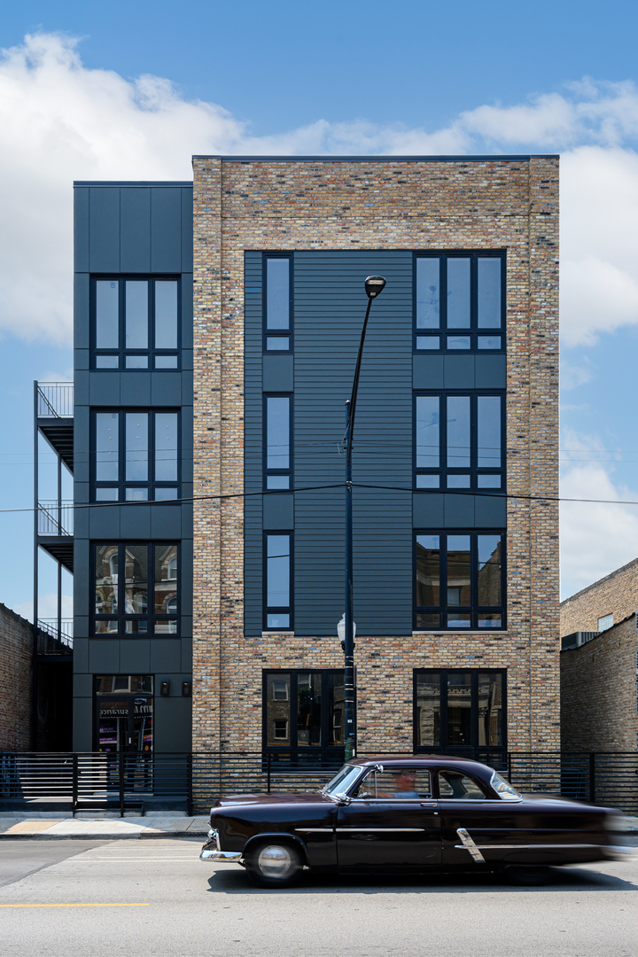 Gorgeous extra wide new construction with sunny southern exposure, huge outdoor space, & parking included. Only 2 units left! There is absolutely nothing like this in the market... elevator building that goes all the way to the roof w/ private roof decks & only 2 units per floor. Open living area, big windows for tons of natural light, and large attached balconies. Modern kitchen with island, Samsung SS appliances, vented hood, and custom cabinets including pantry. Private master suite offers large walk-in closet, oversized shower w/ rain head & wall spray, 2x vanity, and barn style doors. Large hall bath and comfortable size rooms for beds #2 & #3. Storage closet in each unit, full size front loading washer & dryer, & outdoor parking space included in the price. Great Pilsen location on a sleepy stretch of Cermak with wonderful shops and restaurants all around. Welcome home:)