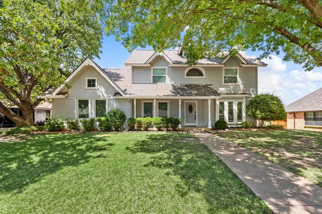 Nestled among mature shade trees on a highly sought-after cul-de-sac, this beautiful two-story home blends curb appeal with everyday comfort. A welcoming front porch, lush landscaping, a new roof, two new HVAC systems, and a detached two-car garage set the stage for what awaits inside. Step through the front door into a spacious, light-filled living room anchored by a cozy brick fireplace—perfect for gatherings and quiet evenings alike. The flowing layout continues into a generous formal dining area or a versatile secondary living space, offering endless options for entertaining. The chef’s kitchen is a true highlight, boasting granite countertops, a stone backsplash, an abundance of cabinetry, expansive counter space, and an inviting breakfast nook. The open-concept design makes hosting effortless, while the split layout ensures privacy for guests. The primary suite is a tranquil retreat, complete with dual vanities, a separate shower, and a relaxing garden tub. Upstairs, discover a sprawling game room with a wet bar—ideal for a pool table, media space, or family fun—plus two additional bedrooms. Step out onto the oversized balcony for a serene view of the backyard oasis. The outdoor living spaces are nothing short of spectacular. A sparkling pool, spacious yard, and both covered and open patios create the perfect setting for summer barbecues, evening cocktails, and year-round enjoyment. A detached two-car garage provides ample space for your vehicles and lawn equipment. All of this within walking distance to award-winning LD Bell High School—making it the perfect place to call home!