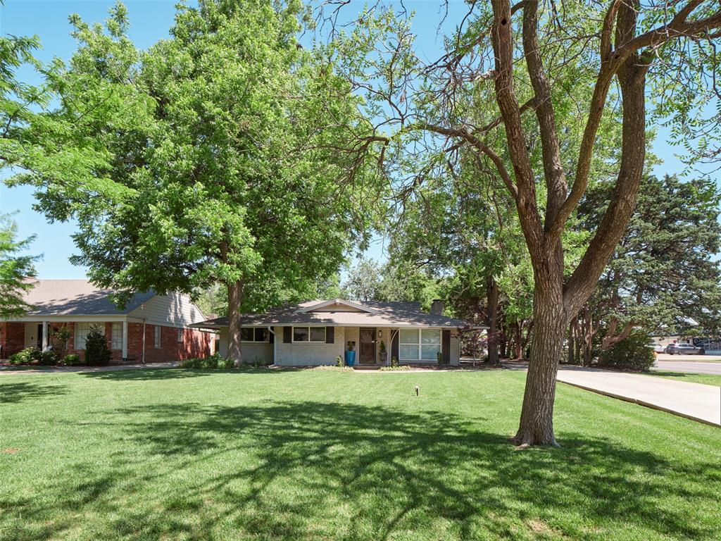 Fully remodeled and packed with personality, this Nichols Hills-area home is anything but cookie cutter! This 3-bedroom, 2-bath contemporary home offers stylish updates, multiple living spaces, and a backyard built for entertaining.The open-concept living, kitchen, and dining spaces flow effortlessly and create the perfect setup for hosting friends and family. The kitchen is loaded with storage, sleek finishes, and even a wine refrigerator. One of the standout features is the heated in-ground pool with its fun foot-shaped design and built-in bench "toes" — a true conversation piece! The turfed backyard adds low-maintenance outdoor space to relax and enjoy year-round.  The third room is perfect for an office or flex room.Additional recent improvements include a new garage door, sprinkler irrigation system, updated driveway access from Tedford Way, plus a new pool pump and pool tile completed in 2025. The oversized 2-car garage offers plenty of room for storage, hobbies, or workspace. With dual access points from both Western and Tedford Way, this property combines convenience, style, and functionality in an incredible location close to shopping, dining, and everything OKC has to offer.