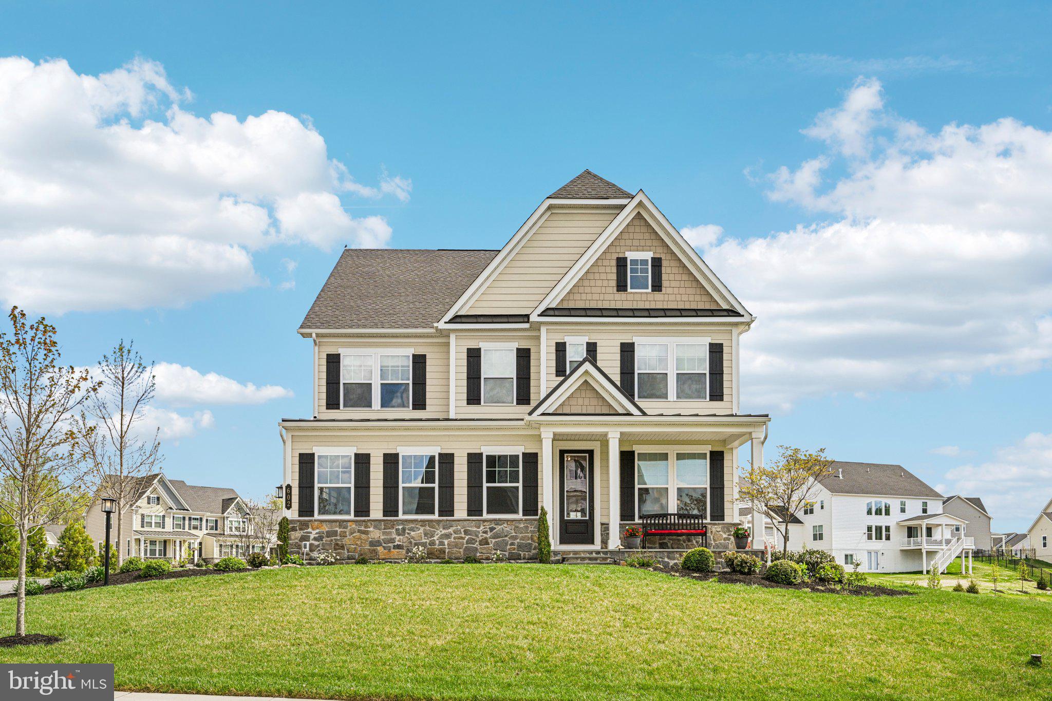 Welcome to this beautiful home in the sought-after Greystone community, known for its scenic setting, sidewalks, and miles of walking trails just minutes from the West Chester Boro, and walking distance to Greystone Elementary. From the moment you arrive, you’ll love the curb appeal with its stone accents and inviting front porch. Inside, the home opens to a bright, airy layout with hardwood floors and abundant natural light. The main living space flows effortlessly into the dining area and kitchen, creating the perfect setup for both everyday living and entertaining. The kitchen features a large island with seating, white cabinetry, stainless steel appliances, and plenty of storage.Upstairs, the master bedroom offers a relaxing retreat with a sitting area, ample closet space, and a private bath. Three additional bedrooms provide flexibility for guests, home office space, or growing needs, along with the convenience of second-floor laundry.Outside, enjoy the comfort of a screened-in porch and beautifully curated landscaping enhanced by outdoor lighting and an in-ground sprinkler system.With its spacious layout, modern finishes, and prime location, this home offers the perfect combination of comfort, style, and functionality—just minutes from shopping, dining, and major routes.