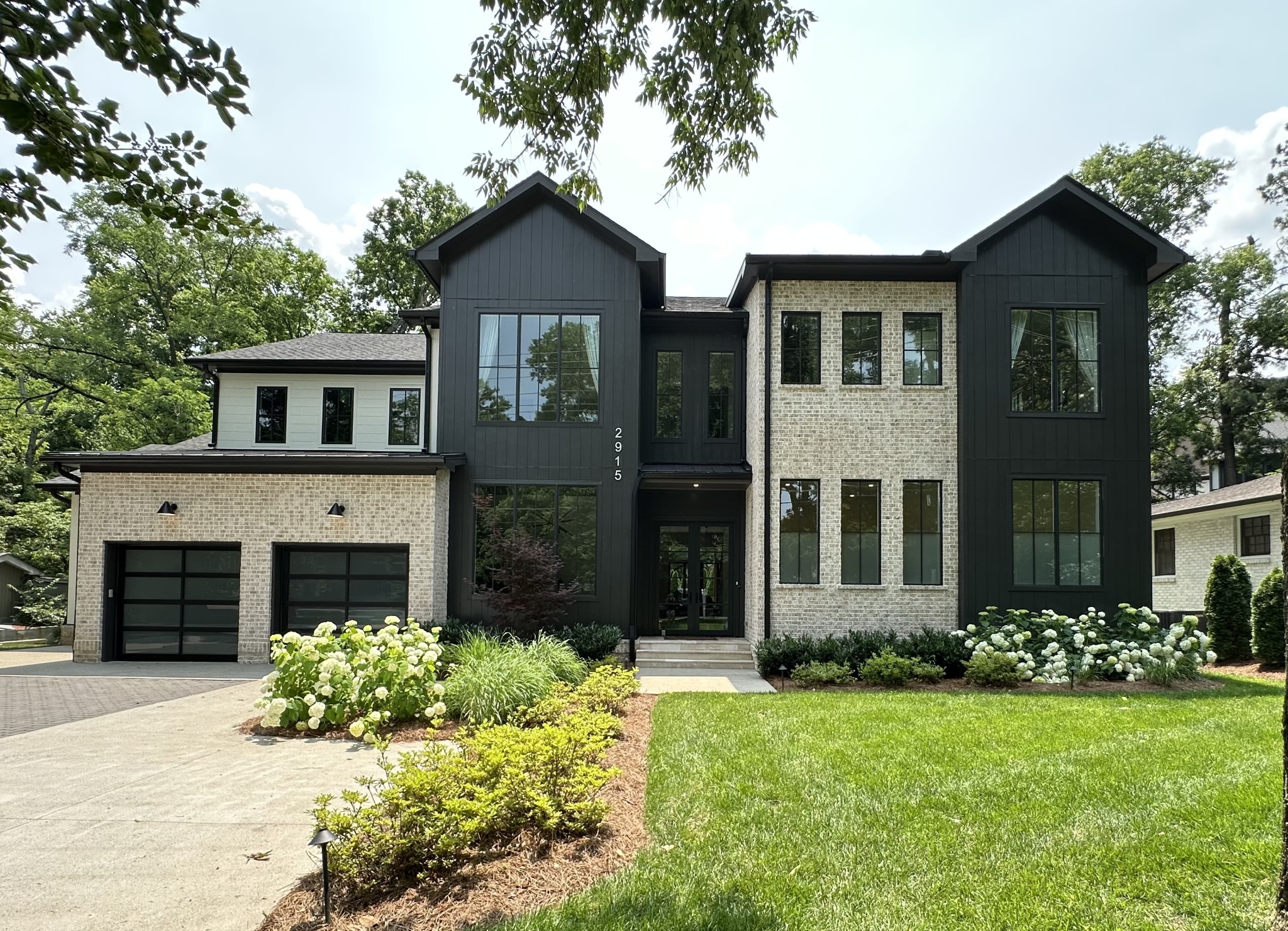 Modern classic architectural awaits on this luxuriously well-designed property with a pool in Green Hills! Nashville Construction Company brings quality through and through with top tier everything. Sublime kitchen with huge butlers pantry/scullery, heavenly primary suite with AMAZING bath and closet, handsome study, five flex spaces on the second level from tiny to enormous to cover all the needs for fitness, theatre, music, hobbies, etc. Outdoor living at its best with pool and spa, outdoor kitchen, wonderful covered porch with fireplace, fully fenced back yard and room to play.  Location allows easy access to Vanderbilt, Montgomery Bell Academy, Ensworth, Harpeth Hall, University School of Nashville, downtown, 440, and BNA. Come see this gem at 2915 Compton Road just off Woodlawn to appreciate all that it has to offer!