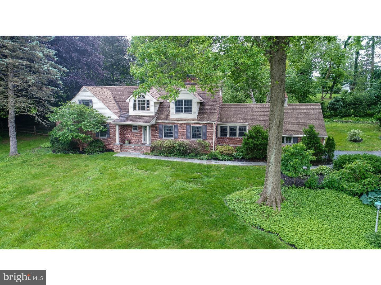 Welcome to this beautifully updated 4-bedroom, 5-bath home with a main floor primary bedroom in the highly desirable Shand Tract neighborhood, located within the top-ranked Tredyffrin-Easttown School District. This exceptional home showcases quality craftsmanship and high-end finishes throughout.  The main level features a stunning primary suite with a luxurious bath including a freestanding soaking tub, frameless glass shower, dual custom vanities, and two spacious walk-in closets. Perfect for someone wanting to downsize with one floor living! The gourmet kitchen is designed for both everyday living and entertaining, offering quartz countertops, white and light gray cabinetry, high-end stainless steel appliances, subway tile backsplash, pantry closet, a breakfast bar that seats three, and an island with abundant workspace. Adjacent to the kitchen is a bright breakfast area and cozy family room, creating a flexible gathering space.  Also on the main level are a second bedroom that can be used as a private office or den, a full bath, formal dining room, and a spacious living/great room with a gas fireplace and beautiful mantle and surround.  Upstairs you will find two oversized bedroom suites, each with walk-in closets and beautifully renovated ensuite baths. The one oversized bedroom can easily be divided into two to create 5 bedrooms.  Dark-stained hardwood floors run throughout the home, complemented by elegant tile work in each bathroom.  The finished walk-out daylight lower level provides excellent additional living space and includes two large windows, a wood-burning fireplace, a full bath, and versatile space ideal for a play area or home office. A large storage area with good ceiling height offers the potential to be finished for additional living space.  Recent improvements by the current owner include a whole-house generator, new rear patio, new furnace and hot water heater (2022), kitchen updates including new countertops and backsplash, new skylights, new appliances, and newly painted cabinets, relined fireplaces, new hardwood flooring on the second floor, and a remodeled basement. This home is truly move-in ready. The Shand Tract neighborhood is known for its beautiful homes, well-maintained properties, and welcoming community atmosphere. Ideally located just minutes from major highways, regional rail lines, Valley Forge National Historical Park, Lifetime Fitness, Trader Joe’s, and the King of Prussia Town Center.  An exceptional opportunity to own a home in one of the Main Line’s most sought-after neighborhoods and school districts. Showings start Wednesday, March 18th.