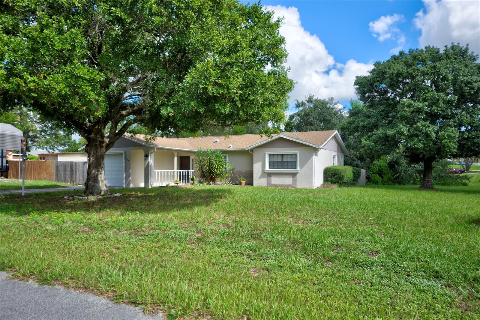 Welcome to 11429 Adelia Street in Spring Hill!!! This inviting 3-Bedroom, 2-Bath home offers 1,209 square feet of comfortable living space and plenty of features to enjoy. Step inside to an updated kitchen offering a fresh and functional space for everyday living and entertaining, the thoughtfully designed open floor plan features comfortable living areas, three bedrooms, and two full bathrooms.Step outside and enjoy Florida living from the enclosed porch/lanai, or screened dining area. Perfect for morning coffee, relaxing evenings, or entertaining family and friends. The fenced backyard offers added privacy with plenty of room for pets, gardening or outdoor activities. Additional features include a single-car garage for parking and storage, and a roof installed in 2017. Conveniently located in Spring Hill near shopping, dining, medical facilities, and recreational opportunities. This home is ready to welcome its new owner. Schedule your private showing today and see the beautiful opportunities here at 11429 Adelia Street.