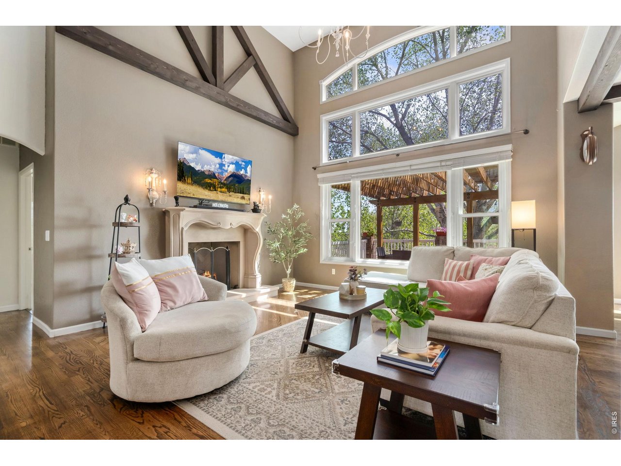 Where timeless design, refined craftsmanship, and an exceptional setting come together in one of Windsor's most sought-after neighborhoods. Perfectly positioned on a cul-de-sac within River West, this distinguished residence offers an elevated lifestyle surrounded by scenic trails, open space, and effortless access to Windsor's premier dining, recreation, and everyday conveniences. From the moment you arrive, the home's striking curb appeal and meticulous attention to detail create an unforgettable first impression. Inside, thoughtfully designed living spaces are filled with natural light, soaring ceilings, and sophisticated finishes that balance luxury with everyday comfort. The open-concept floor plan seamlessly connects elegant entertaining areas with warm, inviting gathering spaces, creating a home that is equally suited for intimate evenings and memorable celebrations. The chef-inspired kitchen serves as the heart of the home, featuring premium finishes, abundant cooking space, and an effortless flow into the expansive living and dining areas. The private primary suite offers a true retreat, complete with a spa-inspired bath and generous walk-in closet, while additional bedrooms and flexible space provide versatility for guests, family, and a dedicated home office area. Step outside to discover an outdoor sanctuary designed for both relaxation and entertaining. Beautifully landscaped grounds create a peaceful backdrop for morning coffee, evening sunsets, or gatherings with friends and family. A pergola covered deck above a walkout basement backing to the neighborhood ponds that are perfect to cast a line. Located in highly desirable River West, residents enjoy miles of walking trails, parks, and convenient access to Windsor Lake, premier golf courses, placing Fort Collins and Loveland just minutes away. More than a home-it is a statement of lifestyle, offering luxury, comfort, and exceptional living in one of Northern Colorado's most desirable neighborhoods.