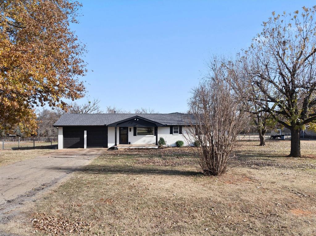 This cute ranch-style home sits on a little over an acre in Edmond with no HOA, giving you room to spread out while still being about three minutes from I-35 and close to all the usual errands, restaurants, and stores. Properties with this much land in town aren’t easy to come by, at this price point. Inside, you’ll find engineered hardwoods, high-efficiency windows, and an updated primary ensuite that keeps the layout comfortable and convenient. The owners have kept up with important updates, including a new roof in 2023, exterior paint in 2024, new piping from the well to the wellhead in 2025, a new pressure tank in 2025, a well pump in 2020, and a hot water tank in 2019. Appliances have been updated along the way as well. This is a well-maintained home with ample space, updates already completed, and a location that makes day-to-day life simple.