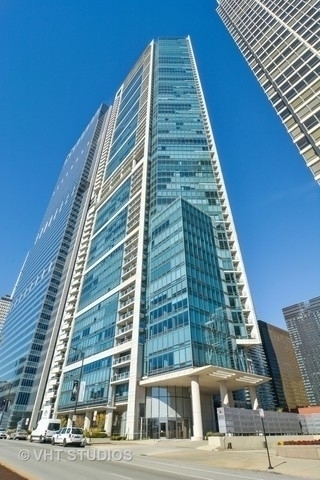 Lakeshore East's Prize. 340 on the Park surrounded by the Lakeshore East Park, Marianos, Maggie Daley Park, Millennium Park and so much more. This central location caters to a complete lifestyle with easy walking access to the office, either on the street or in the underground pedway, bike and jogging path and lake front access, Michigan Ave, Art Institute and more. Residence 3304 features 1902 square feet, a large split bedroom and bathroom floor plan, additional powder room or half bathroom, plus private enclosed 9' x 8' den which can be used as a versatile room. Residence 3304 lives as a TWO AND A HALF BEDROOM with this versatile room lending itself to the perfect "work from home" office, guest room with Murphy bed and office combination, guest room accommodating queen of pullout sofa, day bed, nursery, exercise/yoga room. Pristine and lightly lived in condition, well protected bamboo floors, open kitchen concept with culinary vented hood, top of the line GE Monogram stainless steel appliances, Frigidaire Gallery Series dishwasher & microwave, 6' pantry, quartz counters, full height rectangular shaped glass backsplash, large peninsula with very comfortable seating for four, under mount sink, cook top gas range and oven built into Snaidero cabinetry. Undoubtedly the BEST 2/2.1 bedroom/bathroom + separate enclosed den floor plan 340 On the Park offers, also features a 25' by 20' living and dining room for 6-8 at the table, private balcony off living/dining space. Living room wonderful for entertaining. Full Size, front loading LG Steam Interverter Direct Drive, in-unit washer and dryer (gas vented dryer). Primary suite offers walk-in closet with built-ins, linen closet. Spa-like bathroom with double sinks and Snaidero vanity. Bathroom dressed in natural stone. Separate soaking tub, large shower with frameless glass. Second bath dressed in natural stone and white subway tiles. Gracious foyer large enough for a furniture piece or bench, front hall closet storage. 6' pantry behind and parallel to kitchen. All closets with professional designed built-in shelving and cabinetry throughout Residence 3304. Wired for speakers. A large storage cage outside of the home approximately 7' tall x 5' wide' x 6' deep. Enjoy views of the Lakeshore East Park, city scape and the city lights at night of some outstanding modern architecture. 340 on the Park is a full amenity building including a 24 hour doorstaff, onsite management and maintenance, dry cleaners. Bike storage, Courtesy Guest Parking Program, heated garage with access to Upper, Middle and Lower Randolph for convenience. 25th Floor amenities boast a 4000 square foot gym with magnificent and permanent views to the south, state of the art exercise equipment like Pelotons and cardio theater. Dry Sauna, private steam rooms, 75' indoor two lane lap pool, whirlpool, sundeck, two gas grills and outdoor seating, Winter Garden to use freely or reserve for a private event, private conference and dining room, full caterer's kitchen. Outdoor pet relief area, pedway access on second level of the garage. Just steps to Mariano's and all the Lakeshore East Village Market has to offer. Prime garage parking space very close to elevator bank included in the LIST PRICE. This unit will not last and Brokers, bring your most discriminating buyers.