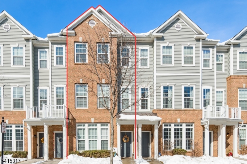 Welcome to the highly desirable Wesmont Station. This beautifully maintained townhome offers modern design, functional space, and exceptional commuter convenience in one of Bergen County's most sought-after neighborhoods. The home features 2 spacious bedrooms, 2,5 bathrooms, and a large loft that can easily serve as a 3rd bedroom, office, or flex space. The kitchen is appointed with stainless steel appliances, granite countertops, a raised breakfast bar, tiled backsplash, upgraded fixtures, and a pantry closet. The dining area is enhanced by a charming bay window, while the sun-filled living room provides direct access to a private patio overlooking the community sports field. Upstairs, the primary suite offers cathedral ceilings, a walk-in closet, and a well-appointed en-suite bath featuring dual vanities, a glass-enclosed shower, and a large soaking tub. A generously sized second bedroom, additional full bath, and versatile loft space complete the upper level. 1-car garage, and a 2nd parking spot. A brand-new furnace was just installed and comes with a 10Y warranty. Located within the vibrant Wesmont Station neighborhood, residents enjoy close proximity to the NJ Transit train station with service to Hoboken and connections to New York City. The community offers parks, playgrounds, sports fields, and on-site retail, including a grocery store. Convenient access to major highways, shopping, dining, and nearby attractions such as American Dream and MetLife Stadium.