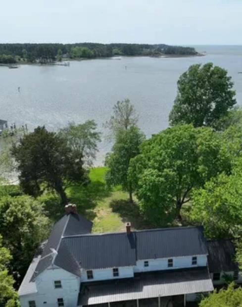 Waterfront Home on Onancock Creek! This charming fixer-upper offers stunning sunsets over Onancock Creek, a deep-water creek that leads out to the Chesapeake Bay. With a brand new Rip Rap, the property provides direct access to one of the few navigable creeks on the lower Eastern Shore. Enjoy a quick boat ride to the Chesapeake Bay or the charming town of Onancock, where you can explore unique shops, restaurants, bakeries, theaters, and art galleries. Plus, you're just minutes from the local hospital and YMCA.