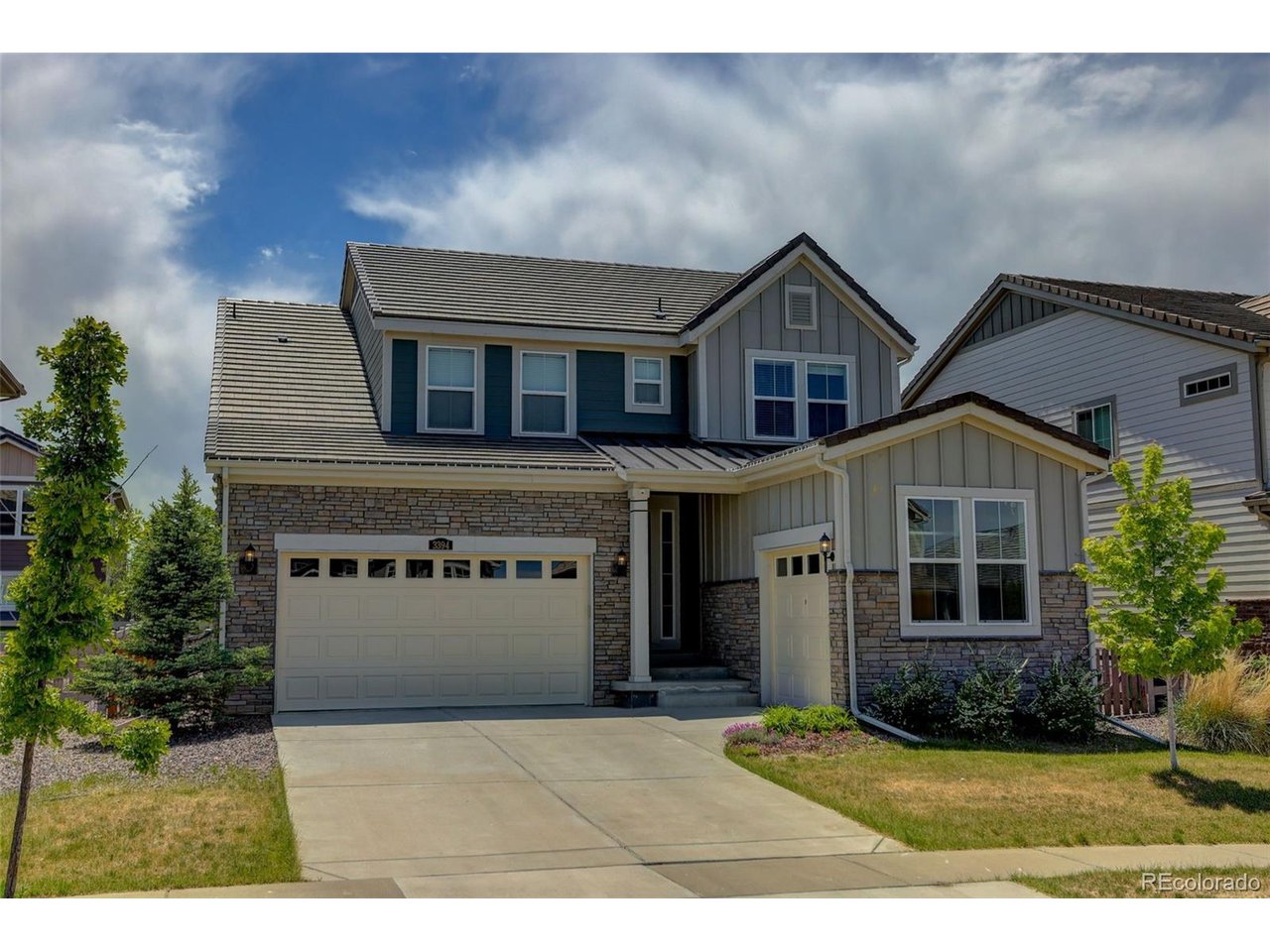 Experience effortless living in this thoughtfully designed and impeccably maintained home in the highly sought-after Anthem Highlands community. Blending comfort, functionality, & exceptional amenities, this residence offers the ideal Colorado lifestyle. The inviting family room features a cozy heat-enhanced fireplace, creating the perfect gathering space. Just off the main living area, double doors open to a private main-floor office, ideal for remote work or quiet study. The culinary-inspired kitchen showcases premium finishes, generous prep space, and seamless flow for entertaining. Nearby, a built-in planning center with extensive counters, and cabinets offers flexibility for organization, homework, or work-from-home needs. A convenient bath & functional drop zone with built-in bench complete the main level. Upstairs, the spacious corner primary suite offers a relaxing retreat. An additional ensuite bedroom provides privacy & convenience, while two secondary bedrooms share a well-appointed bath. The upstairs laundry room adds everyday practicality & ease. Integrated smart home technology enhances daily living with Ring security, smart garage access, keyless entry, whole-home Wi-Fi infrastructure, app-controlled lighting, built-in networking, & prewiring for home security and advanced media systems. Dual attached garages on opposite sides of the home offer ample parking, storage, & flexibility. Enjoy life in one of Colorado's premier master-planned communities with scenic trails, parks, playgrounds, tennis, basketball, & volleyball courts. The renowned Anthem Recreation Center offers a water park, children's pool, lap pool, fitness center, studios, clubhouse, & community events. Nearby Anthem Parkside features a lake, sports fields, skatepark, rink, pump track, fishing, amphitheater, & more than 48 miles of interconnected trails. Conveniently located for commuting while offering unmatched neighborhood amenities, this home captures the best of Colorado living.