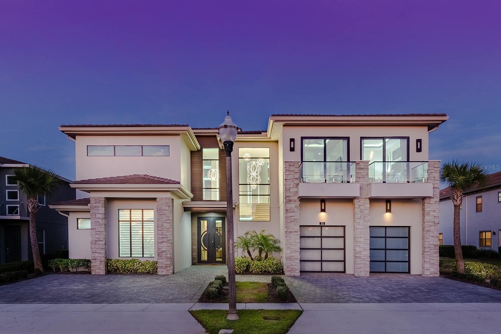 Modern 9-bedroom luxury estate in Reunion Resort with over 9,100 sq.ft. of high-end living and entertainment space. This home is a rental powerhouse and one of the most unique offerings in Reunion—featuring a resort-style pool & spa, multiple indoor/outdoor entertainment zones, and designer finishes throughout.The main level offers a grand open layout with upgraded furnishings, a chef’s kitchen, and seamless indoor/outdoor flow to a massive lanai overlooking Reunion’s championship golf courses. The outdoor space includes a large pool with spillover spa, in-pool loungers, summer kitchen, and multiple covered hangout areas.Inside, the home delivers unmatched amenities: a full theater room with reclining seating, an upstairs entertainment loft with bar, game tables, and balcony, a fitness room, and two incredible themed bunk suites. All nine bedrooms include en-suite baths and modern décor.Located in one of Reunion’s most sought-after sections, this property is the total package—luxury, space, modern updates, and exceptional rental performance. A true statement home built for large families, groups, or the investor seeking a top-tier short-term rental asset.