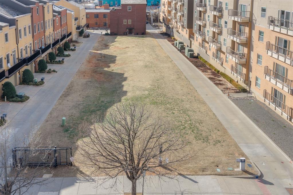 This exceptional downtown infill parcel represents a rare opportunity within the highly desirable Brownstones at Maywood Park, a boutique, walkable townhome development located in the heart of Oklahoma City’s urban core. Situated in the Flatiron / Deep Deuce district, this address places you directly across from the landscaped open space and park that define Maywood Park — offering both serene urban greenery and immediate access to the vibrancy of downtown living. In the center of thriving Downtown Oklahoma City with easy walking access to Bricktown, Automobile Alley, Midtown, Scissortail Park, Paycom Center and a growing collection of restaurants, coffee spots, galleries, and entertainment venues. Designed for urban lifestyles — transit, pedestrian access, and city experiences are right out your front door. Build your Downtown dream here! The lot has 70 ft of frontage along Oklahoma Ave and is 25 ft deep.