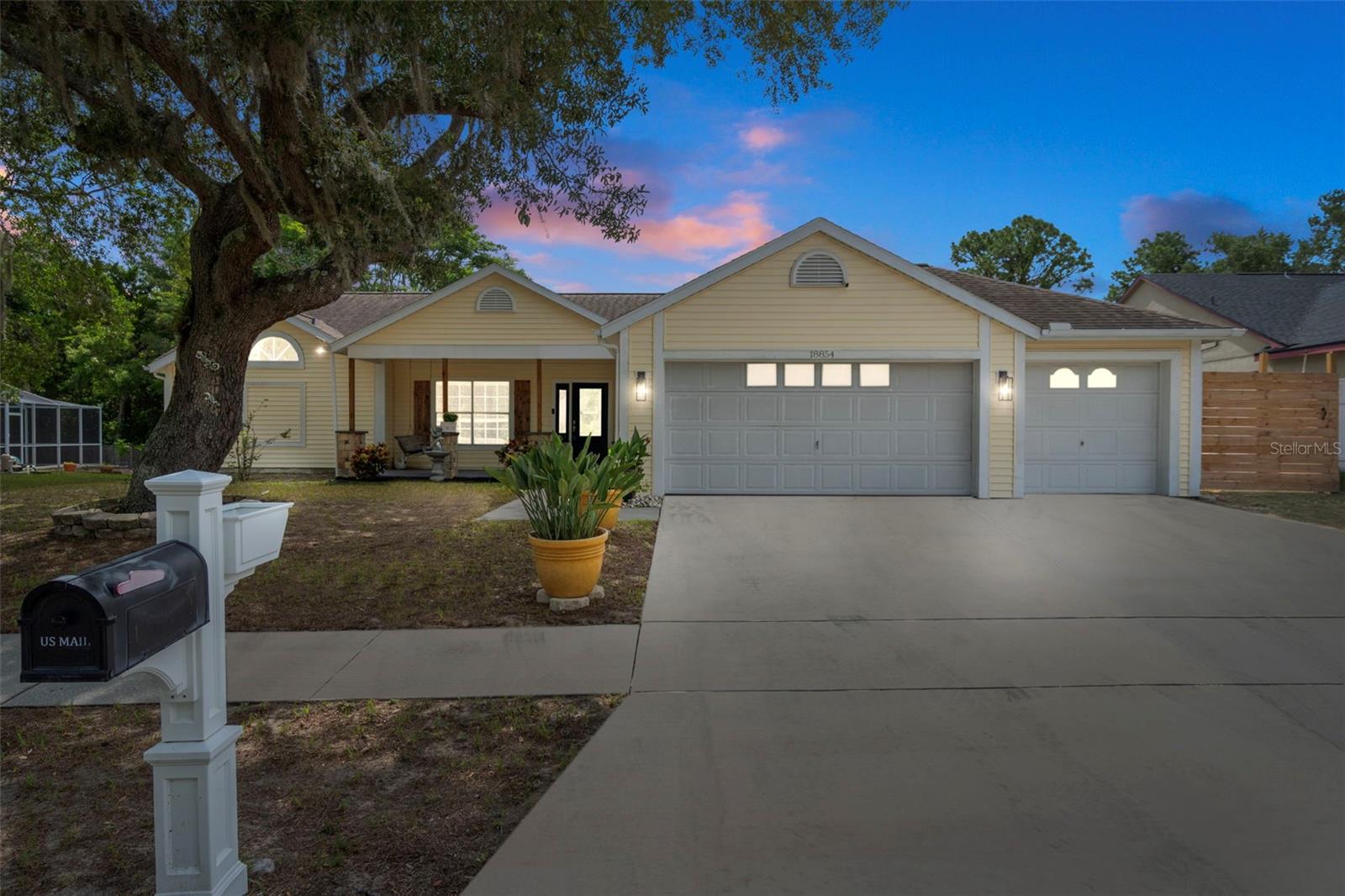 Under contract-accepting backup offers. This beautifully maintained 3-bedroom, 2-bathroom pool home in Hudson offers 1,776 sq ft of comfortable living space, blending curb appeal with peace of mind. Located outside the flood zone on a high and dry lot, this property has experienced no hurricane damage—an impressive level of resilience that’s uncommon in Florida. Safe, Stylish, and Storm-Resilient! Upon entering, you'll find an open and airy floor plan with high ceilings and luxury vinyl plank flooring throughout. The bright kitchen boasts granite countertops, white cabinetry, and a brand-new stainless-steel refrigerator, making it ideal for casual meals or entertaining. The spacious primary suite spans the length of the home and features real oak wood flooring, a garden tub, a separate shower, dual closets (including a walk-in), and serene views of the backyard deck. Both bathrooms have been tastefully updated, and the home is equipped with upgraded R-30 insulation (2023) and an HVAC system with UV light for improved comfort and efficiency. Step outside to your own Florida oasis—a screened, in-ground pool with an updated paver deck (2020), an 18x33-foot Trex deck, and a covered lanai perfect for gatherings. The property includes a 3-car garage and a 12x24-foot storage shed, providing ample space for vehicles, tools, or hobbies. The fenced backyard is a gardener’s paradise, featuring grapevines, fig, pear, olive, and kumquat trees, along with a peach tree that yields over 100 peaches annually and a thriving pineapple patch. Additional benefits include no HOA restrictions and a prime location in Hudson, conveniently close to schools, shopping, dining, and Gulf Coast recreation. Whether you seek a full-time residence or a vacation retreat, this storm-ready home offers a perfect blend of safety, comfort, and style.