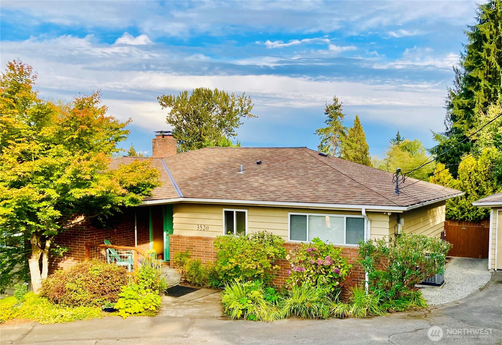 Lovely corner-lot home in Brier! Bright and open with refinished hardwoods, wall of windows, and upper deck views. Updated kitchen with stainless appliances leads to laundry area and new backyard deck. Freshly painted main floor includes primary suite, additional bath and 2nd bedroom.   Daylight basement with new carpet, 8-ft ceilings, 2 more beds, bonus room, and dry storage—easy duplex potential. Enjoy a 1/3-acre lot with mature plants and fruit trees, detached 2-car garage with work-space, and RV parking. Heat pump for comfort year-round.   Comfortable layout, unique to the area. All in Brier, "Small-town living in the middle of everything!" Close to I-5, 405, and Light Rail. Welcome home!
