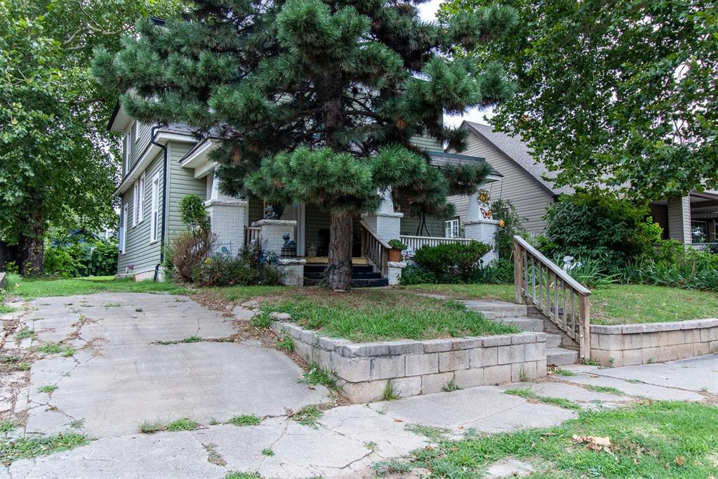 THIS BEAUTIFUL HOME HAS NUMEROUS ORIGINAL FEATURES FROM THE 12" CASE AND BASE, GLASS DOOR TO THE LIVING AREA, 1910 FIREPLACE MANTEL, POCKET DOORS, BASEMENT AND MORE. THIS IS A TRUE GEM. 3 BED 2 FULL BATH. ALL BEDROOMS ARE UPSTAIRS, YOU HAVE TO GO THROUGH 1 BEDRROM TO GET TO THE 2ND ONE. THE 3RD BEDROOM ALSO HAS A SITTING AREA THAT COULD ALSO BE A STUDY OR NURSERY. THE CLOSET IN THE DINING AREA WAS ONLY ADDED AS TEMPORARY. WONDERFUL LARGE FRONT PORCH. LARGE BACK YARD WITH AN INGROUND CELLAR AND STORAGE BUILDING. 
SELLER WILL CONSIDER ANY AND ALL OFFERS RECEIVED BY 12:00 NOON ON JULY 29, 2025. PLLEASE ALLOW AT LEAST 2 DAYS FOR ACCEPTANCE ON ALL OFFERS. SELLER WILL NOT TURN ON OR ALLOW TO BE TURNED ON PRIOR TO CLOSING ANY ADDITIONAL UTILITIES. SELLER RESERVES ANY AND ALL MINERAL RIGHTS NOT PREVIOUSLY RESERVED.
