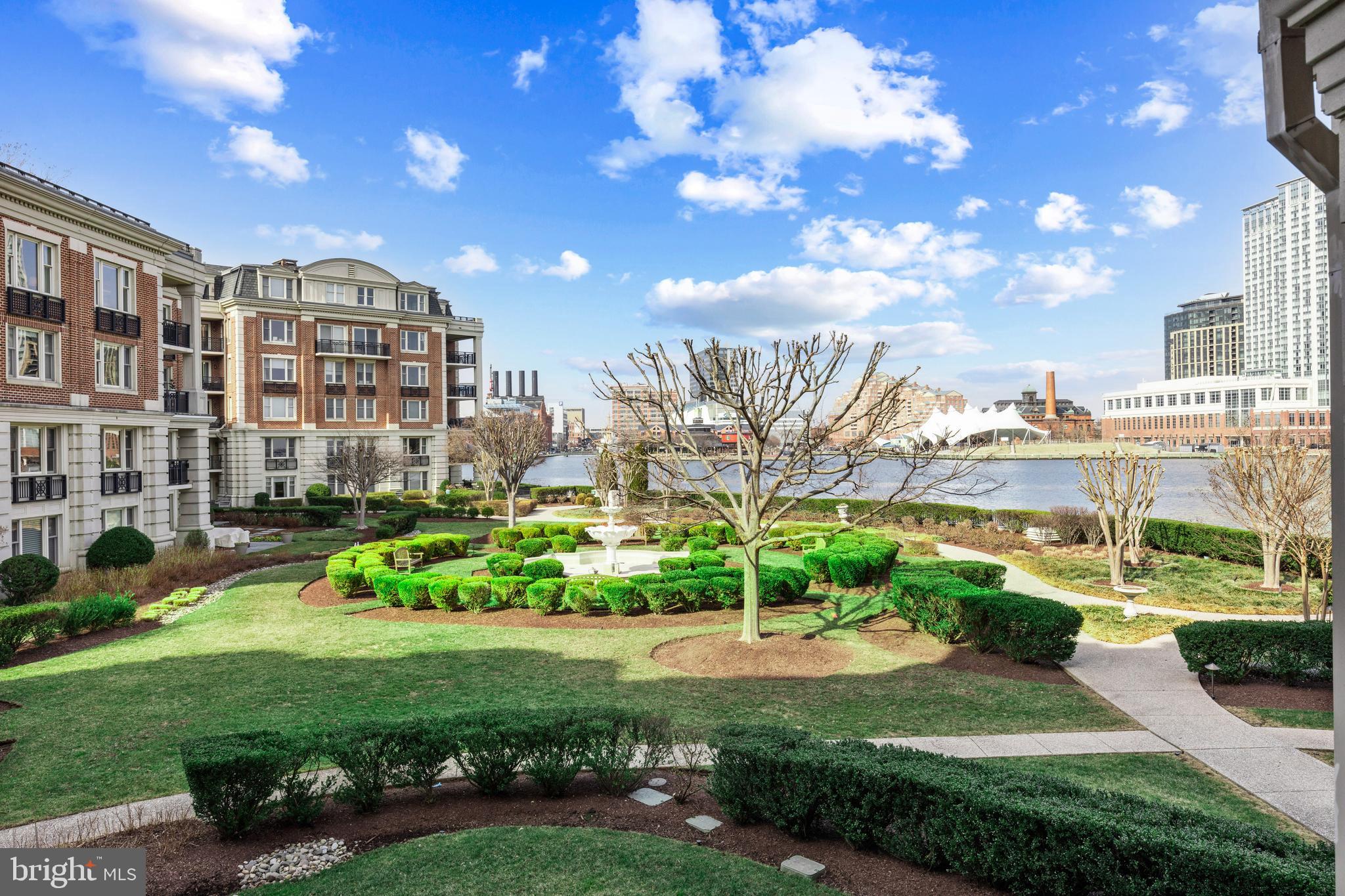 Contemporary waterfront living in this exceptional 2 bedroom, 2 bathroom, 1,650 square foot residence at Baltimore's premier luxury condominium. This gorgeous home showcases rich hardwood flooring, a gourmet kitchen appointed with Viking stainless steel appliances, and a spacious primary suite featuring a spa-inspired bath. Wonderful views from every room frame the beautiful English Gardens and the Inner Harbor, filling the home with natural light throughout. Arrive via your semi-private elevator into a private vestibule before entering an elegant, thoughtfully designed floor plan that blends luxury with everyday comfort. One parking space and a separate storage space are included with the sale. Unwind in the private community gardens before stepping directly onto the Baltimore Promenade to catch the water taxi or enjoy a scenic stroll along the harbor. The building's world-class amenities include 24/7 concierge and security, valet parking, a doorman, porter service, pristine gardens, an indoor heated saltwater pool, a fitness center with a dedicated movement studio, a community theater, six guest suites, and multiple elegant event spaces. Minutes from Baltimore's vibrant arts district, Ravens and Orioles games, and with convenient access to BWI Airport, I-95, and Penn Station, this residence offers the perfect blend of luxury, comfort, and accessibility. Discover waterfront living at its finest at The Ritz-Carlton Residences. Schedule your private showing today!