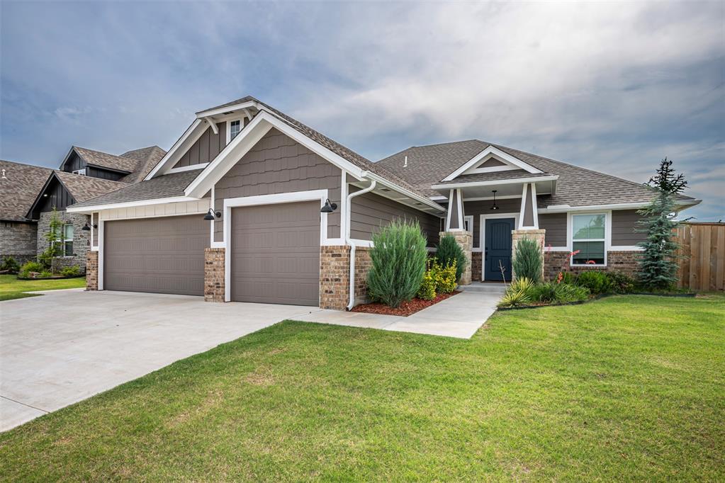 GREAT price ! Seller says Let's Get it sold. The refrigerator, washer and dryer stay. This beautiful 4-bedroom, split-plan bungalow home is only 3 year old. It has the extras: storm shelter, fence, blinds, sprinkler system, and a large side yard. Open plan allows the natural light into the kitchen, living and dining rooms, it's perfect for entertaining or relaxing. Granite countertops in the kitchen, custom cabinetry, LARGE pantry & so much more! Appliances include gas range, microwave and dishwasher. Wood-look tile in the main living areas, mud  room bench, fireplace, LARGE closets tons of storage throughout. This unique and inviting craftsman style home is filled with character and gorgeous style. St James Place addition is a little gem in SE Norman's latest hot spot with a lot of restaurants, retail, banks and shopping being built along Hwy 77. The community has picturesque walking trails along with a luxurious clubhouse with a pool and basketball court.