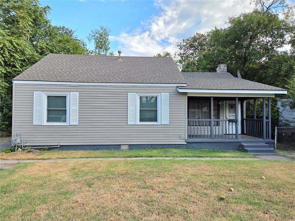 Welcome to this charming bungalow in a great location! This remodeled home features granite counters in the kitchen, resurfaced original hardwood floors, and is light and bright with lots of storage. Indoor laundry room with ample space for a folding table. The gas fireplace has been reworked so that you can enjoy a roaring fire in your large living room. The owner's suite bedroom is oversized allowing enough room for a sitting area. The owner's suite bathroom has an updated granite vanity and a large walk-in closet, with built ins. The back yard is quiet and peaceful with mature trees, and a detached garage. Come take a look!