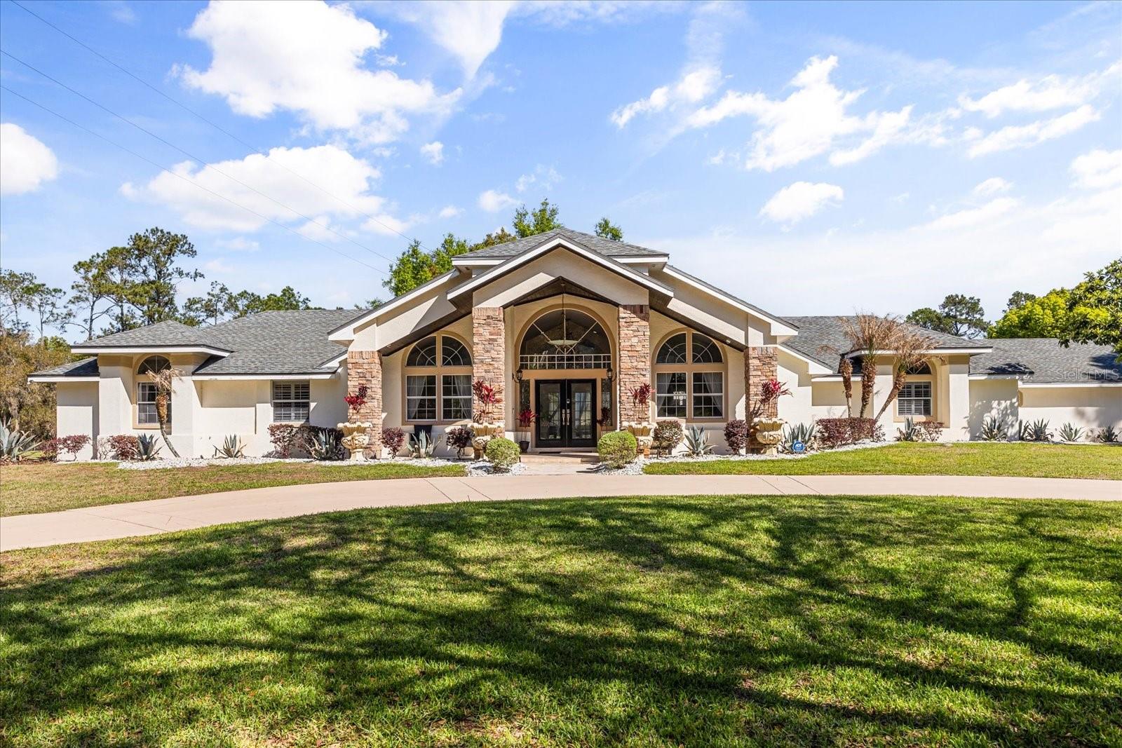 Welcome to Alaqua Drive, Luxurious Upgraded Excutive Home Reflects Timeless Appeal **Sprawling Over An Acre of Tropical Green & Fresh Landscape**Enclaved in the Estate Gates of Alaqua- the Areas Most Respected Gold Gated Communities**Features Include:Sun-filled Home**Natural Stone &Hardwood Floors on a spectacular Open Space that Boasts **5 Bedrooms* & *a Family Lounge. Large cathedral ceilings** Expansive Gourment Chef Kitchen w/ Large Island & State of the Art Applliances**Walk-in Pantry **Three-Car Garage**Large sparkling Heated Pool w/ Screen Enclosure**Oversized Lanai Built In-Stainless Steel Summer Kitchen Grill**Abundant Storager & Large Closets to be Found Everywhere** Make this well-maintained Spectacular Home Your Own. Located just North of Downtown Orlando**Very Desirable Lake Mary School District**This Residence is 50 minutes from Both Attractions and Beaches**Convenient to Fine Dining**Shopping & All of the Amenities Seminole County Has to Offer*- call for more information**TANKLESS water heater**Solar heated Pool**Both Air Conditiong Units 5 Years Old**Water Heater 5 Years Old**Generator 5 Years Old**All Bathrooms And Kitchen Fully renovated.**House has been updated with newer pipes and so on.