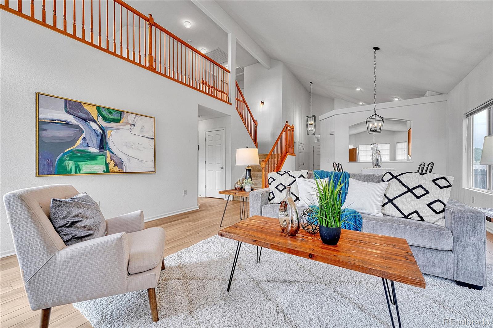 DISCARD DAYS ON MARKET. COME BACK & SEE BRAND NEW LUXURY VINYL THROUGHOUT MAIN FLOOR (Aug. 2025). NEW COUNTERS (Sept. 2025) NEW LIGHTING (Sept 2025).  You will love this bright, open home with low maintenance - professionally designed xeriscaped backyard, & more.  The entryway greets you with a towering vaulted ceiling. The kitchen features new STAINLESS STEEL APPLIANCES, 42" cabinets, QUARTZ counters and sunny eat-in bay-window breakfast nook for casual dining. Next, you're ushered into the dining & living room filled with natural light & VAULTED CEILINGS. French doors invite you into the wide-open MAIN FLOOR PRIMARY SUITE with multiple windows, & 5-PIECE BATHROOM. The custom walk-in closet is cleverly hidden behind a floor to ceiling mirrored door. Upstairs, you'll be greeted by the large LOFT perfect for an office, casual living, playing, or whatever hobby you may have. Both secondary bedrooms are spacious with large closets.  The secondary bathroom features DOUBLE SINKS, QUARTZ counters, with large vanity and doored off tub / toilet area making it easy for multiple people to get ready at the same time. Outside, relax in this backyard oasis featuring flagstone patio, variety of trees, grasses, and beautiful blooms.  BRAND NEW washer & dryer. (Summer 2025) NEW ROOF & EXTERIOR PAINT 2024. Occupied by the original owner, this home has been IMMACULATELY cared for. MOVE-IN READY. The unfinished basement has egress windows and a structural floor making finishing that much easier.  SOLAR will be paid off at closing. NOTE: The Air Conditioning is a Heat Pump w/ Furnace back-up. The heat pump cools well in the summer. Purchased and installed in 2022. Buyers have the optional opportunity to join the Pinery Country Club or The Club at Pradera both featuring beautiful golf courses. This home is also near Bing Lake  with its gorgeous walking path and catch & release fishing.