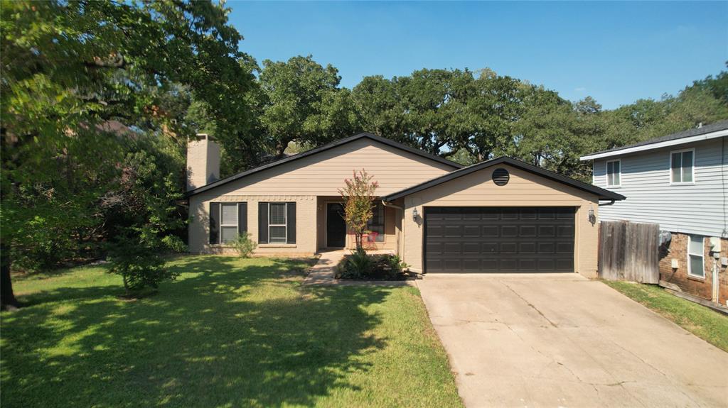Welcome HOME! Rarely does a move-in-ready, one-story four-bedroom home in the heart of Bedford become available—and this one is ready for its new owner! This versatile floor plan offers plenty of space for everyone. Enjoy cozy evenings by the fire in the inviting front family room, or gather in the family den for movie nights. Thoughtful updates and attention to detail are evident throughout this beautifully maintained home.The recently remodeled kitchen is sure to impress, featuring custom cabinetry, a pantry system, and a large center island that will make any chef green with envy. Both bathrooms have been tastefully updated with designer cabinetry, beautiful tile, and updated showers.Throughout the home, you'll find new carpet and solid-surface flooring, making this home truly move-in ready. Need a little extra space? The versatile flex room is perfect for a private home office, craft room, study, or whatever suits your lifestyle.Step outside to enjoy the freshly painted (inside AND OUT), expansive covered deck—perfect for relaxing or entertaining on crisp fall evenings. The backyard also features a large enclosed storage building, with plenty of additional room to play, garden, or simply enjoy the outdoors.And there's even more: the roof was replaced in August 2026!If you're looking for a home where the major updates have already been taken care of and all you have to do is move in and enjoy, THIS IS IT! Buyer and Buyer agent to verify all information.