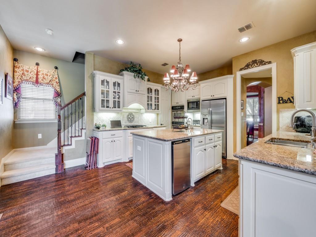 This much desired stunning LUXURY HOME's floor plan rarely becomes available for sale in coveted HUNTERS CREEK.  This nearly 5K square foot Luxury Home combines style, comfort, & thoughtful upgrades—all at one of the lowest price per square foot in ALL OF FRISCO for a home this large WITH A CUSTOM RIVERBEND POOL. You are greeted by a massive luxurious Iron Double Front Door with Large Sidelight System that cost 5 figures recently to install.Step inside the luxurious entry & you’ll be greeted by rich hand-scraped hardwood floors & a chef’s dream kitchen with a massive granite island, prep sink, double ovens, upgraded cabinetry,  & stainless steel appliances. The open family room features soaring 20-ft ceilings, creating a bright  & inviting space for entertaining.The first-floor owner's suite is a private retreat with serene backyard views of the POOL  &  Patio, an upgraded shower, & granite vanities. Upstairs is reachable by 2  staircases that leads to a spacious retreat including:In-Law Suite with ensuite bathroom Huge game room with game closet & linen closet,Wired media-theater room, Loft area, Bonus 5th bedroom (perfect as a gym, study, or flex space). Add'l Highlights:Riverbend custom pool in private backyard with beautiful board on board fence with concrete reinforced retaining wall,Solid-core doors downstairs,Covered front porch, Upgraded hardware & fixtures throughout,Hunter Douglas wooden blinds  & shades throughout, Sunscreen window screens on back of house, 5 figures spent on Landscaping in front yard alone recently.Professional tree & shrub care by Monster Tree.Community Perks:Hunters Creek is one of the area’s most sought-after neighborhoods, offering miles of scenic trails, lush landscaping, multiple pools, a lazy river, splash park,  & playgrounds. Plus, it’s zoned to top-ranked Liberty High School. With its prime location, extensive upgrades, &unbeatable neighborhood amenities. Ask 4 update list