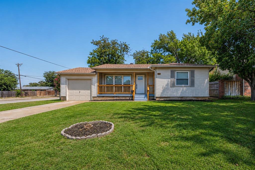 Prepped and ready for new owners! This updated 3-bedroom home in North Irving is ready to start its next chapter. Step inside to luxury vinyl plank flooring throughout, updated vinyl windows for improved energy efficiency, and a bright, open layout. The kitchen features cool updated retro-style cabinetry, upgraded quartz countertops, and new stainless steel appliances, including a gas range and vent hood, and opens directly to the living area for easy everyday living and entertaining.Unlike many surrounding homes, this property offers a dedicated laundry room for added convenience. Updates continue throughout with new interior doors, trim, ceiling fans, lighting, door hardware, and more. The updated bathroom is a must-see, featuring a stylish shower with a dual-head system.Outside, enjoy a fenced backyard with patio space that's ready for cookouts, pets, or relaxing with friends. The front porch has also been enhanced with attractive cedar railing, adding warmth and curb appeal. With thoughtful updates throughout, this North Irving home is waiting for its new owners!   Eligible for FHA Financing.