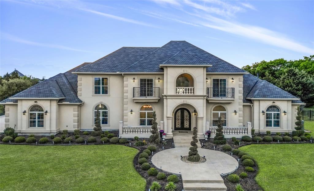 Great Location! Just minutes from premier shops, restaurants, US-75, and Hwy 121, this stunning custom home is nestled on a quiet cul-de-sac in the prestigious Hawks Wood subdivision. Situated on over an acre, this elegant residence was built in 2020 and features an open floor plan with soaring ceilings and an abundance of natural light.
With 5 bedrooms and 5.5 bathrooms, this home also includes a game room, two living areas, a formal dining room, a gourmet kitchen with a breakfast nook, an outdoor kitchen, a covered back patio, and a 4-car garage.
The chef’s kitchen seamlessly connects to the living area and breakfast nook, with easy access to the expansive backyard — perfect for entertaining. The luxurious main suite features a spacious dual-head shower, a bathtub, dual vanities, and a generous his-and-hers walk-in closet. A second suite is conveniently located on the main floor, ideal for guests.
Meticulous attention to detail throughout blends luxury and sophistication, making this extraordinary house your next home.