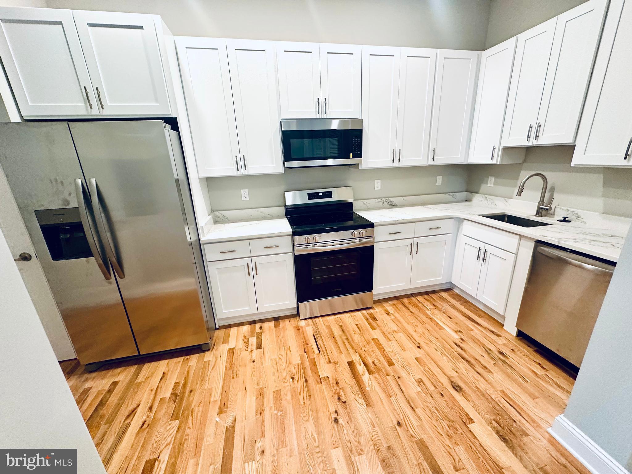 Welcome home to brand new 100 W. Lexington Street! You will love this bright and airy studio apartment in the heart of downtown. The location is ideal as its walking distance to the central business district, restaurants and shopping, MT Vernon, the Charles street corridor, a short bike ride to the University of Baltimore and the University of Maryland, and more. There are various units with sweeping views of the skyscrapers of the central business district and expansive views down liberty street towards the new CFG Arena. The building features high ceilings and lots of light, Stainless steel appliances, quartz countertops, all in one washer dryers, central AC, beautiful lighting, tile bathrooms, hardwood floors and more. The building was completely renovated with all new plumbing, electric, HVAC, sprinklers, elevator and more. Furnished apartments and parking available for an additional cost.