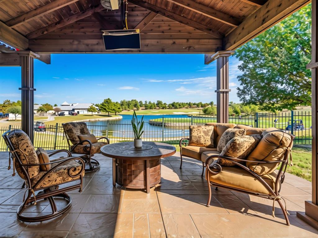 RARE DOUBLE-GREEN GOLF COURSE & WATER VIEWS IN FRISCO LAKES! An extraordinary opportunity to own one of the most captivating golf course settings in Frisco Lakes by Del Webb, Frisco's premier 55+ active adult community! Perfectly positioned to showcase breathtaking views of BOTH the 1ST AND 18TH GREENS of the Frisco Lakes Golf Course, along with a picturesque water view, this home offers a truly exceptional backdrop for everyday living! The crown jewel is the SPECTACULAR EXTENDED COVERED PATIO, spanning the ENTIRE WIDTH OF THE HOME with an extended roofline, creating an incredible outdoor living space for entertaining, relaxing, and enjoying the peaceful golf course and waterfront scenery. Imagine morning coffee overlooking the greens, watching golfers finish their rounds, or hosting friends against this unforgettable panoramic backdrop! Inside, the beautifully maintained home features rich HARDWOOD FLOORS, freshly painted cabinetry, elegant GRANITE COUNTERTOPS, updated lighting fixtures, and painted kitchen cabinets with under-cabinet lighting. The kitchen also features a recently updated cooktop and microwave. Beyond the home, discover the unmatched lifestyle of Frisco Lakes, featuring an 18-hole championship golf course, THREE amenity centers, indoor and outdoor swimming pools, fitness centers, pickleball, tennis, scenic walking trails, and an incredible variety of clubs and social activities. Conveniently located near Lake Lewisville, shopping, dining, and major thoroughfares. GOLF COURSE HOMES ARE SPECIAL, BUT A HOME WITH VIEWS OF TWO GREENS AND THE WATER IS TRULY EXTRAORDINARY! Experience resort-style living with a view you'll never grow tired of! Be the first to see this home at our Open House this Saturday from 12-3pm.
