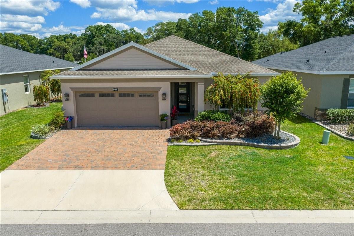 OFFERED FULLY FURNISHED. This elegant and meticulously maintained, custom-built Connect model by Shea Homes offers a truly exceptional setting within one of Ocala’s most desirable communities. Positioned on a rare, private homesite with no rear neighbors, this property captures peaceful views of mature live oaks, walking trails, and the golf course beyond. Well-appointed furnishings create a true showcase designer home. Located inside the gated community of Ocala Preserve—just minutes from the renowned World Equestrian Center—this home delivers the perfect balance of luxury, lifestyle, and convenience.Featuring 1,894 square feet of luxury living with 3 bedrooms, 2 bathrooms, a 2-car garage, and a dedicated flex room/office, the layout is both functional and refined. Upon entry, upgraded ceramic tile flooring and a thoughtfully designed split floor plan lead into a bright, open-concept living space filled with natural light and tranquil views.The chef’s kitchen serves as the centerpiece of the home, showcasing an oversized island, quartz countertops, custom solid wood cabinetry, stainless steel appliances, and a gas range—ideal for both everyday living and entertaining.With over $60,000 in upgrades, this home stands apart, including an extended brick-paver lanai with birdcage enclosure—perfect for enjoying Florida’s outdoor lifestyle in comfort and privacy.Large windows throughout the home enhance the light, airy atmosphere while framing the serene outdoor setting leading to the lanai featuring an enclosed bird cage. The primary suite offers a peaceful retreat with views of the backyard and golf course, complemented by an ensuite bath featuring dual vanities, quartz countertops, a beautifully tiled walk-in shower with glass enclosure, Toto bidet, and a spacious custom walk-in closet.Additional features include professionally designed landscaping, water softener systems, epoxy-coated garage and entry flooring, solar-powered attic fan, 50-amp outlet for RV or EV charging, custom wall paneling in the flex room/office, and upgraded finishes throughout.Residents of Ocala Preserve enjoy a resort-style, amenity-rich lifestyle. The HOA includes lawn and landscape maintenance, high-speed fiber-optic internet, and access to world-class amenities: An 18-hole golf course, indoor and outdoor fitness centers, group classes, over 21 miles of scenic walking and biking trails, pickleball, tennis, bocce, horseshoes, a fishing dock, and water activities. The community also features a clubhouse, course, the popular Salted Brick restaurant, and an on-site spa.This is a rare opportunity to own a thoughtfully upgraded home in a private, premium setting within one of Ocala’s most sought-after resort-style communities..