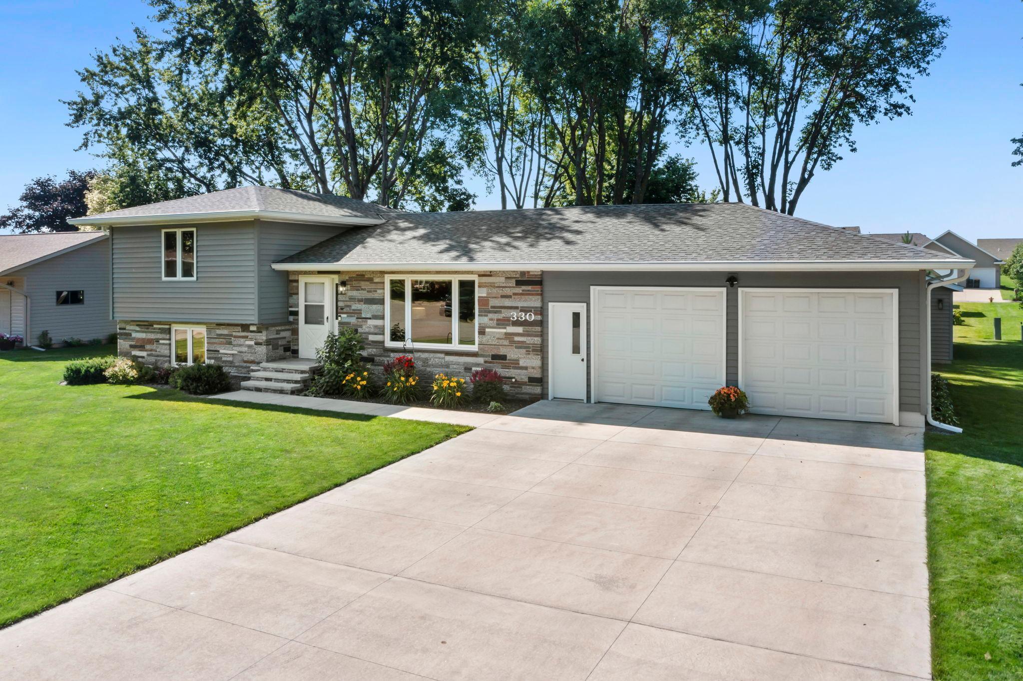 Discover this beautifully maintained 3-bedroom, 2-bathroom gem tucked away in a quiet Freeport neighborhood. Just minutes from Hemker Park & Zoo and Main Street, this home offers the perfect blend of small-town charm and modern convenience—close to dining, scenic parks, and major roadways for easy commuting.

Lovingly cared for by its original owners, the home radiates pride throughout. The spacious living room welcomes you with cozy carpeting, oversized windows, and abundant natural light—perfect for relaxing or entertaining. The adjoining kitchen features timeless wood cabinetry, generous counter space, and a serene backyard view. It flows seamlessly into a bright dining area with nearby access to a 15x13 deck for effortless indoor-outdoor living.

Upstairs, two inviting bedrooms are located near a full bath with an extended vanity and hallway linen storage. The lower level is designed for entertaining, boasting a cozy bonus room with wood paneling, a built-in media center, and a stylish bar area complete with granite countertops, sink, shelving, and a mini fridge. A third bedroom with ample storage is also found on this level. The lowest level features a versatile family room, a well-equipped laundry area, and an extra storage room to complete the layout.

Outside, enjoy a beautifully landscaped yard with a patio, storage shed, and your own apple trees—Honeycrisp and Connell Red—ready to harvest each fall. With a new roof (2023) and seamless steel siding (2024), this move-in-ready home is full of character, thoughtful updates, and charm—ready for its next chapter!