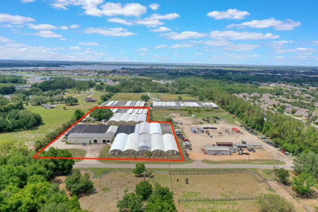 Under contract-accepting backup offers. Prime 4.86 Acres Zoned A-1 in Winter Garden – Rare Opportunity!

Now available—4.86 acres of A-1 zoned land just off Avalon Road in the thriving Winter Garden area. ***This unique property is adjacent to an additional 9.57-acre parcel of vacant land also for sale. For details on the adjoining parcel, see MLS #O6278339 – 3103 Avalon Rd.***

Currently operating as a successful ornamental plant nursery, the site features an impressive 8,115 sqft metal building, which includes approximately 1,500 sqft of air-conditioned office space with four offices and two restrooms. The remaining 6,615 sqft serves as warehouse space, complete with two loading docks and a service ramp—perfect for agricultural, storage, or light industrial use. Additional structures include four greenhouses, a trailer, and a security fence enclosing the property (excluding the boundary shared with the neighboring 9.57-acre parcel).

Enjoy excellent access to major roadways including Florida’s Turnpike, SR-408, and SR-429, making transportation and logistics a breeze. The property is also near top destinations such as Disney’s Magic Kingdom, Winter Garden Village, Historic Downtown Winter Garden, Horizon West Town Center, and Downtown Orlando.  Situated on the edge of the Lake Avalon Rural Settlement, this property offers the ideal blend of accessibility and agricultural charm.